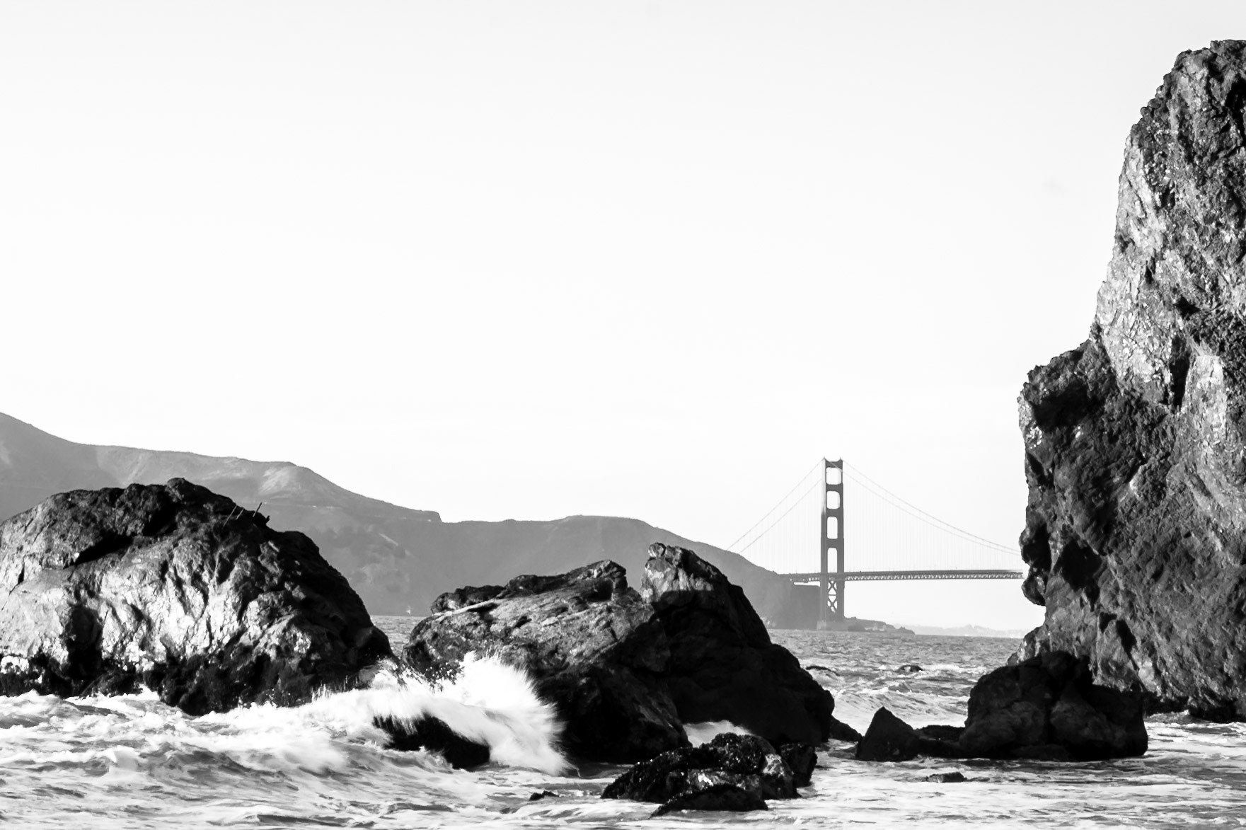 The Golden Gate Bridge  provides the backdrop to these breaking waves at South Bay.