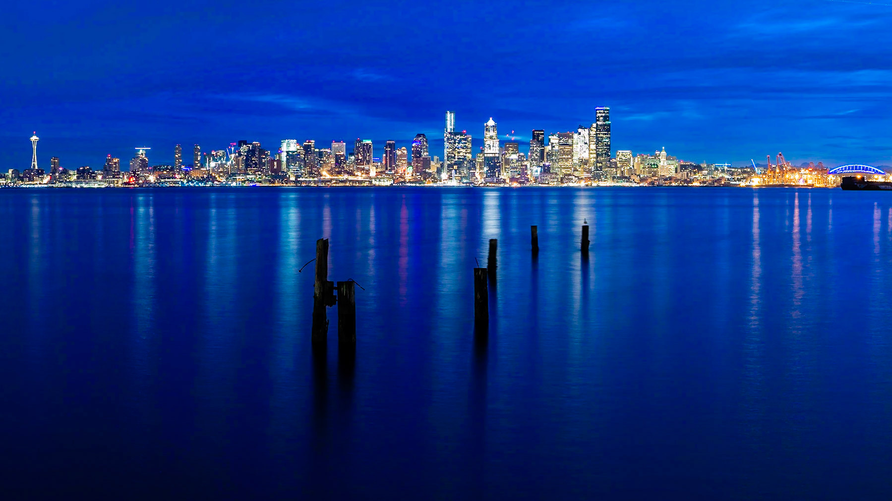 Sunrise in Seattle, Washington State, viewed from Seacrest Park across the bay to Downtown.
