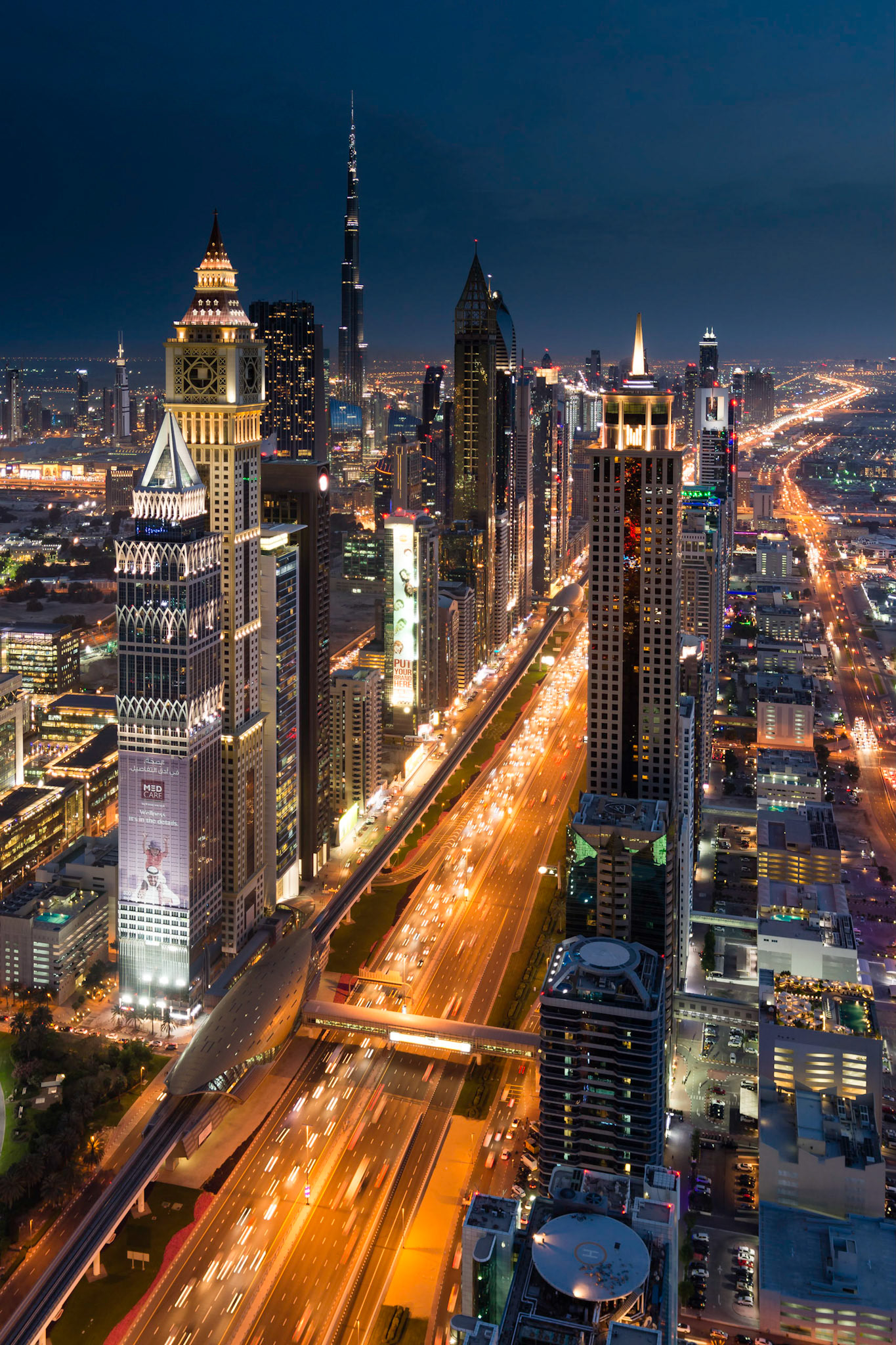 This view of Sheikh Zayed road looks southbound towards Business Bay and the Burj Khalifa.