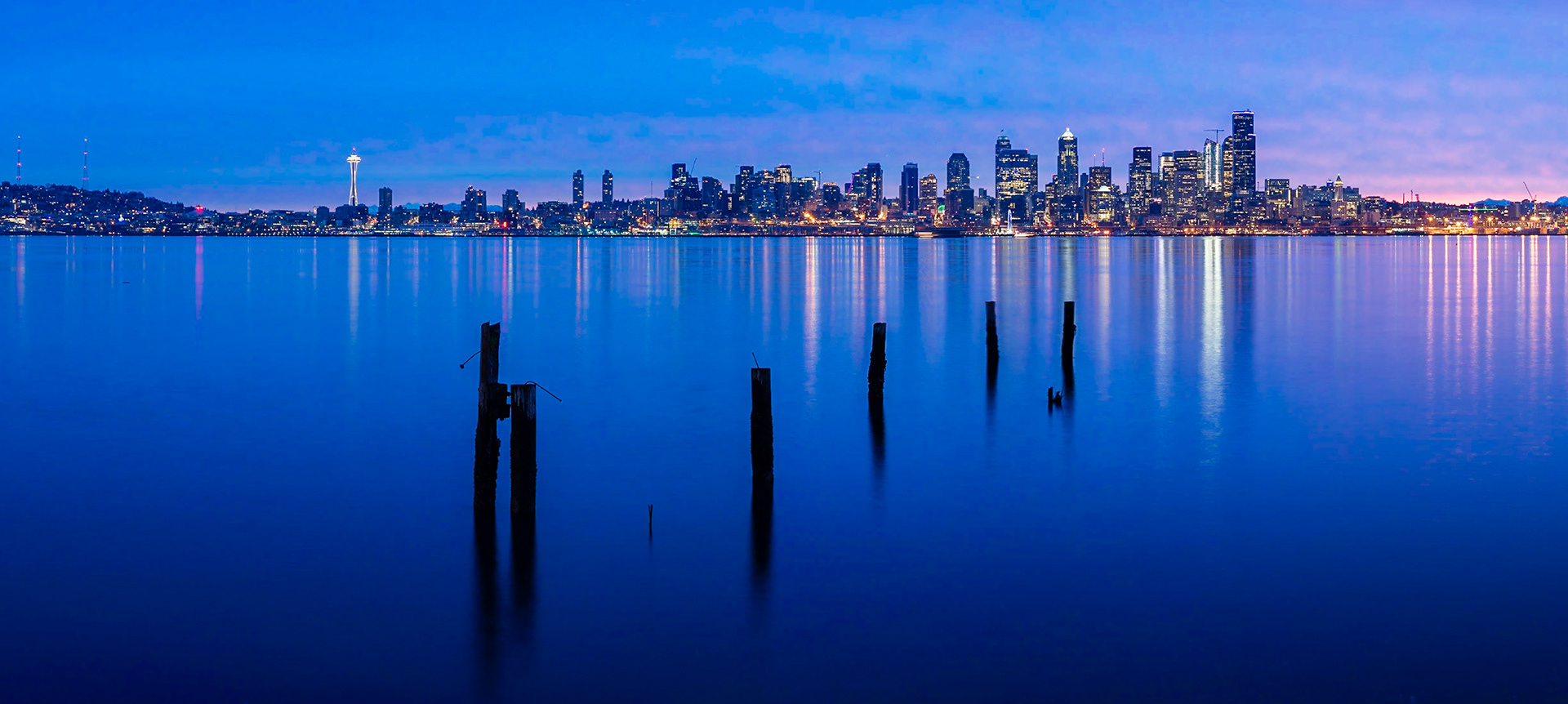 Captured from Seacrest Park in West Seattle, the bay is calm as the city awakes.