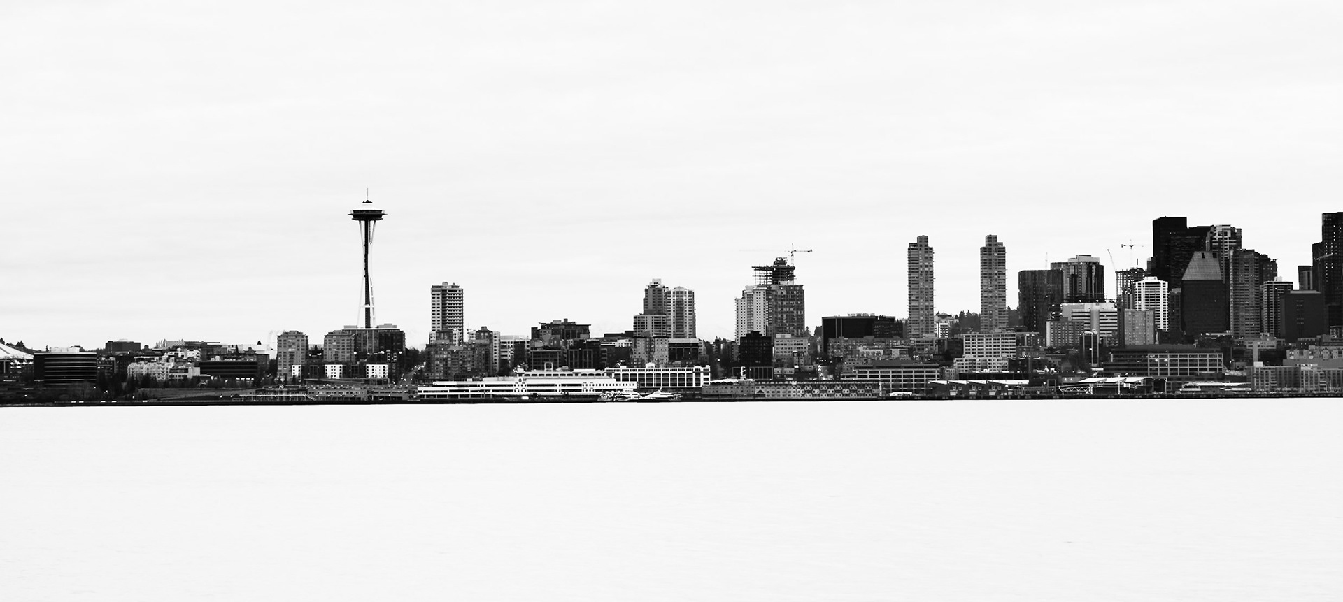 Sunrise in Seattle, Washington State, viewed from Seacrest Park across the bay to Downtown.
