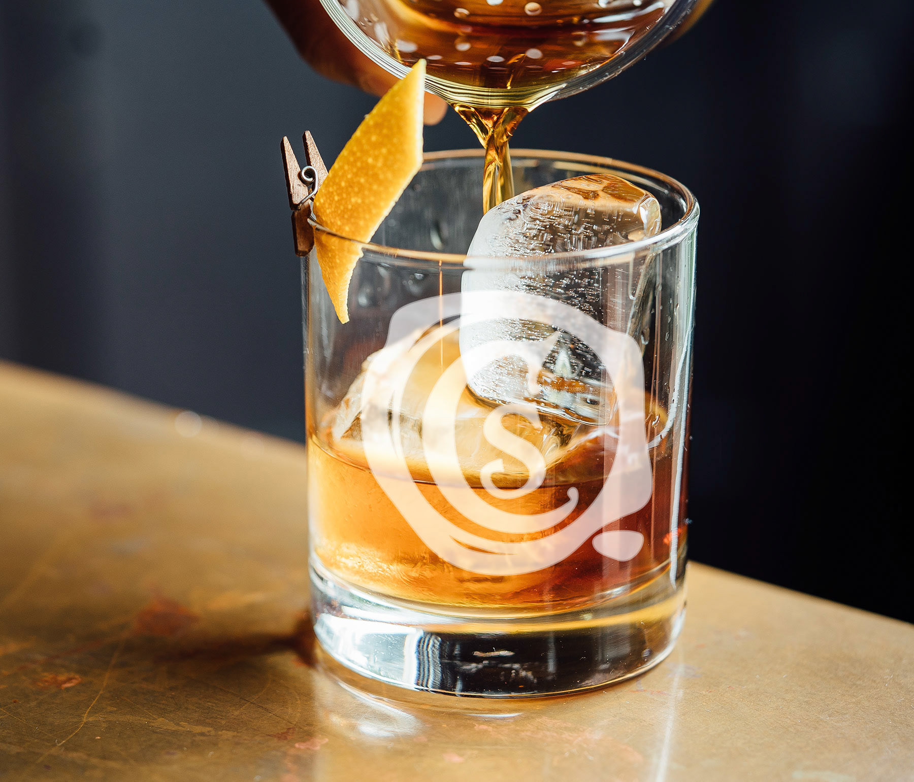 Rocks glass with frosted logo branding