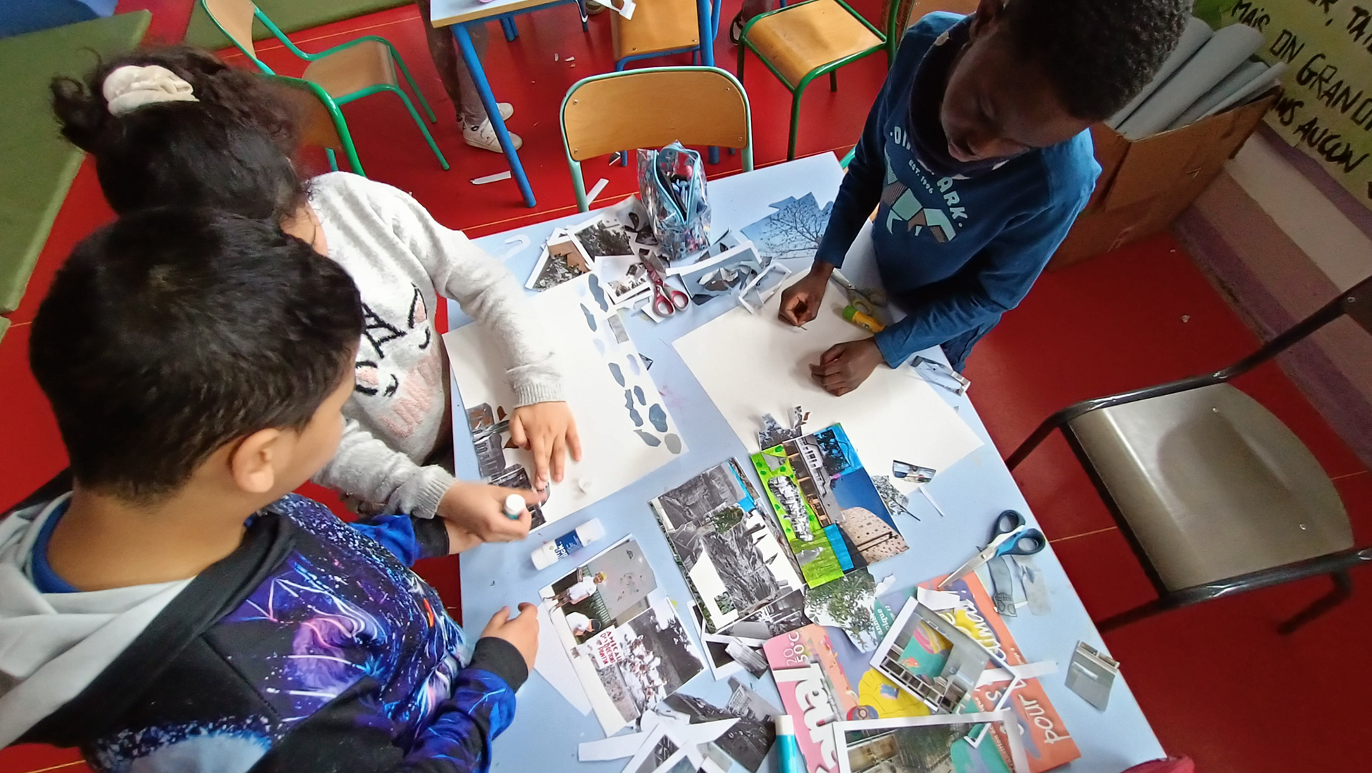 Creating a collaborative booklet, that included covers front and back and a poster by group of 3 children