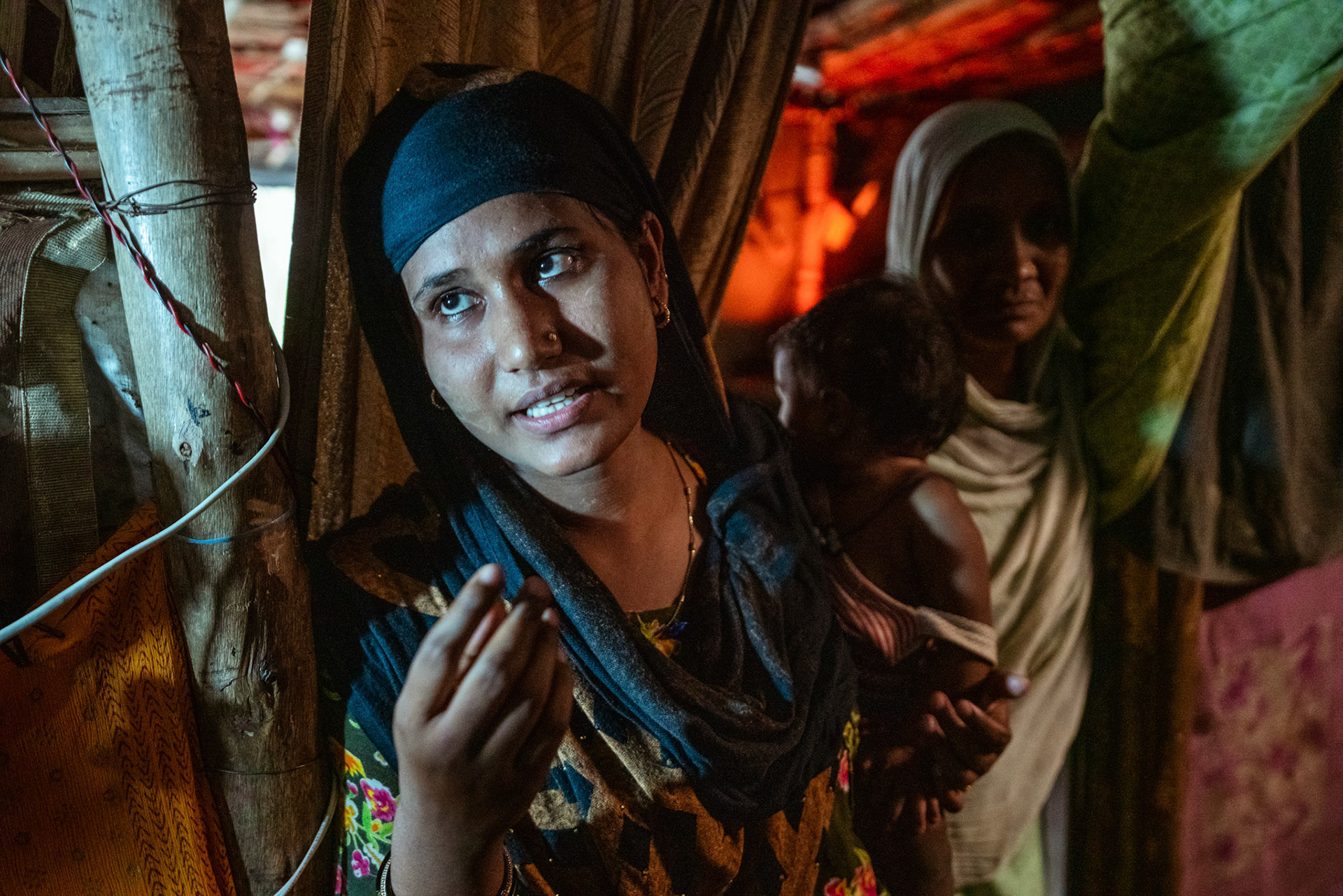 A group of refugees standing outside their home in Tilak Nagar, Delhi. The daughter, the mother informs us is extremely keen in educating herself but does not have enough access to education opportunities.