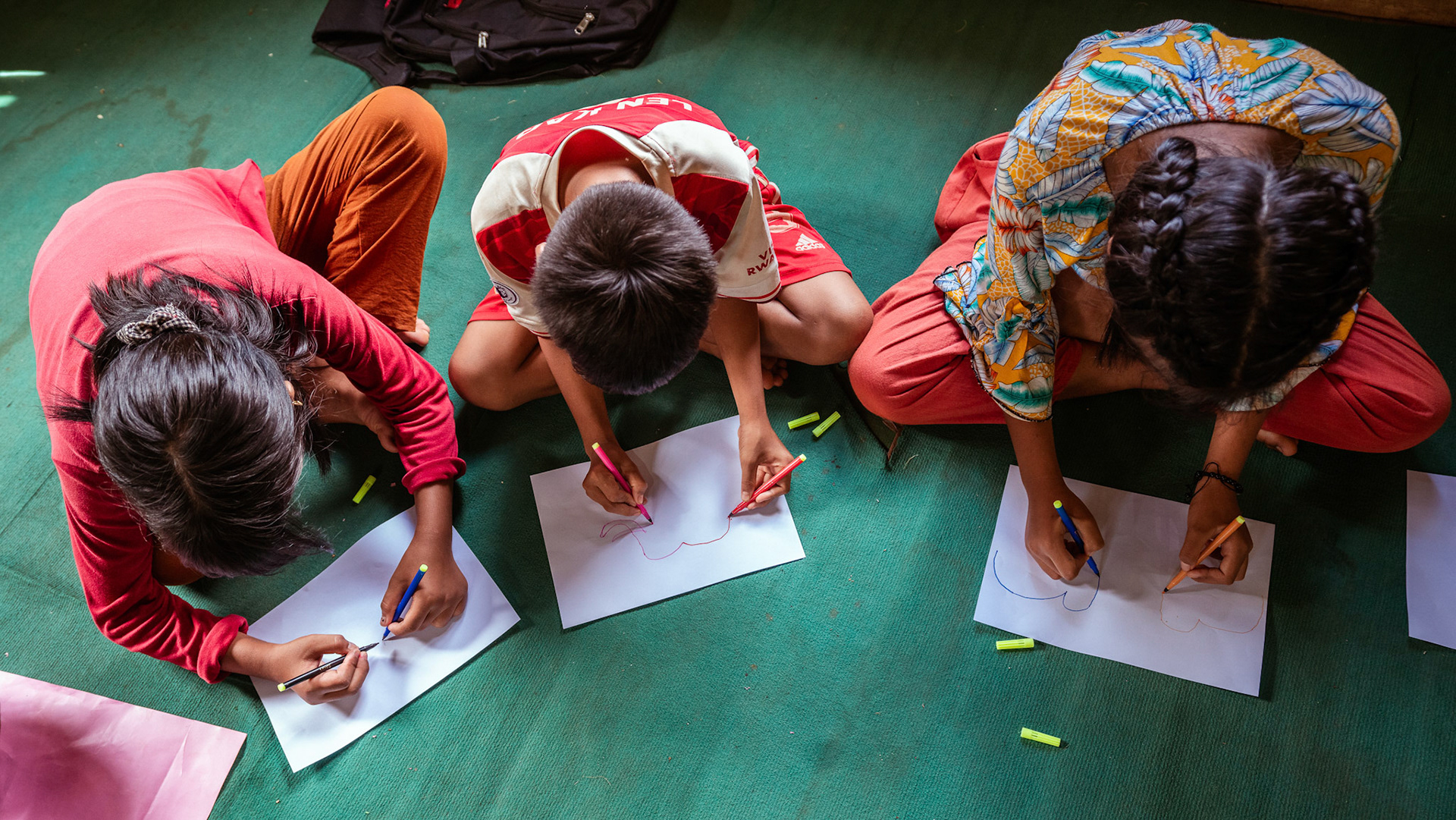 Refugee children during the 'Tree of life' sessions organised by Catholic Relief Services (CRS) in Moreh, Manipur.The “Tree of Life” is a psychosocial support tool based on narrative practices that is designed to help participants accept the hardships of their past and identify the strengths that can help them a
