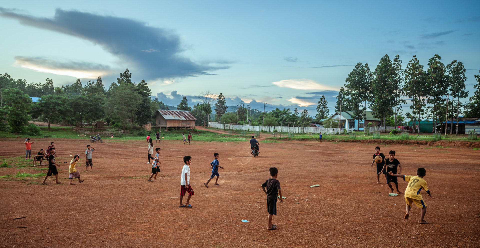 Refugee children playing football outside their homes in Moreh, Manipur.