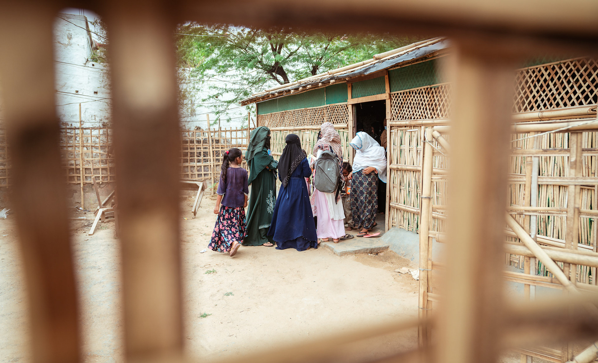 Women in Mewat, Haryana, gathering at a language learning centre to participate in community strengthening activities organised by members of CRS.