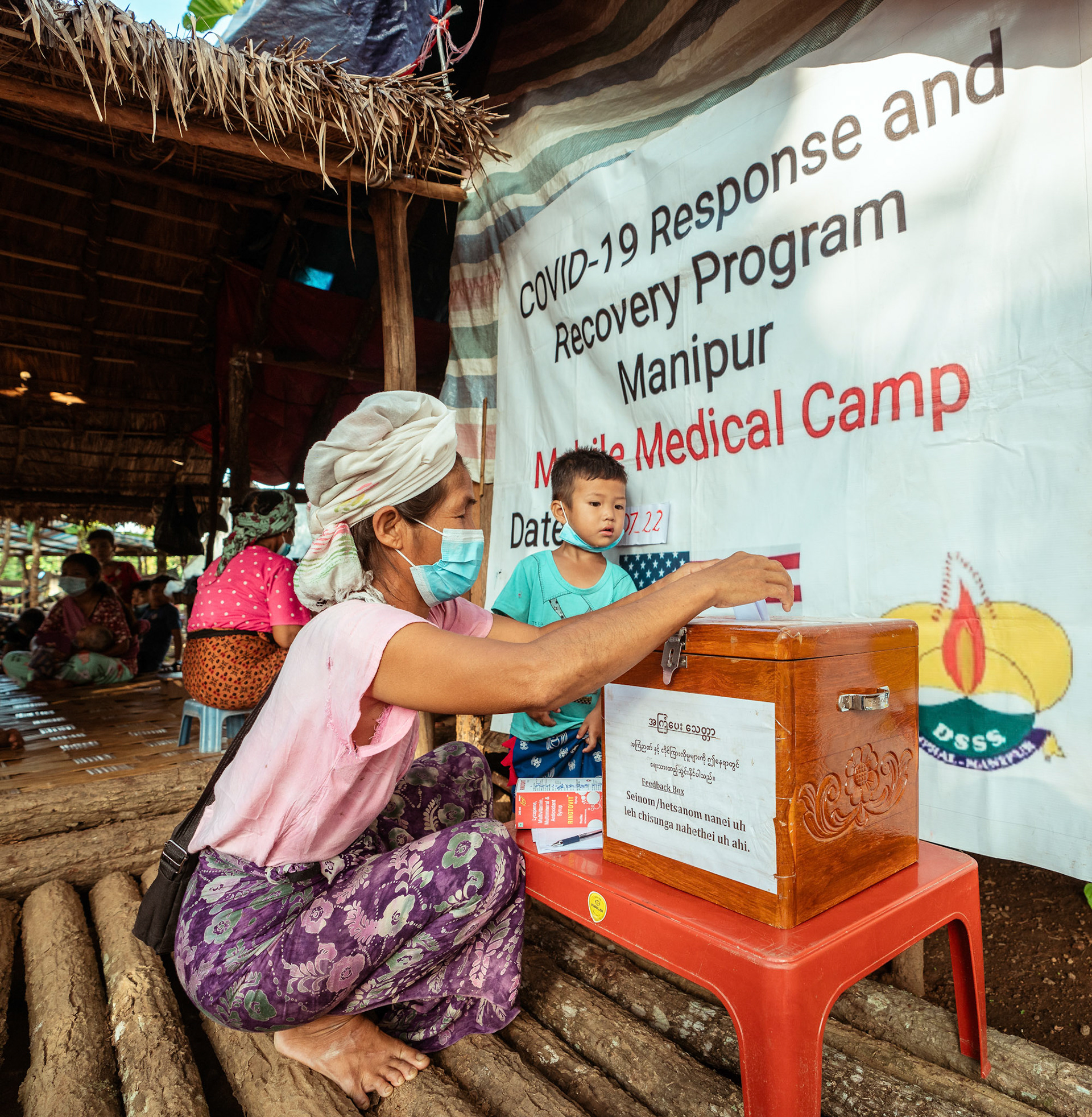 Refugees in Moreh, Manipur, submitting feedback during the medical camp organised by CRS as a part of COVID-19 Response and Recovery Program.
