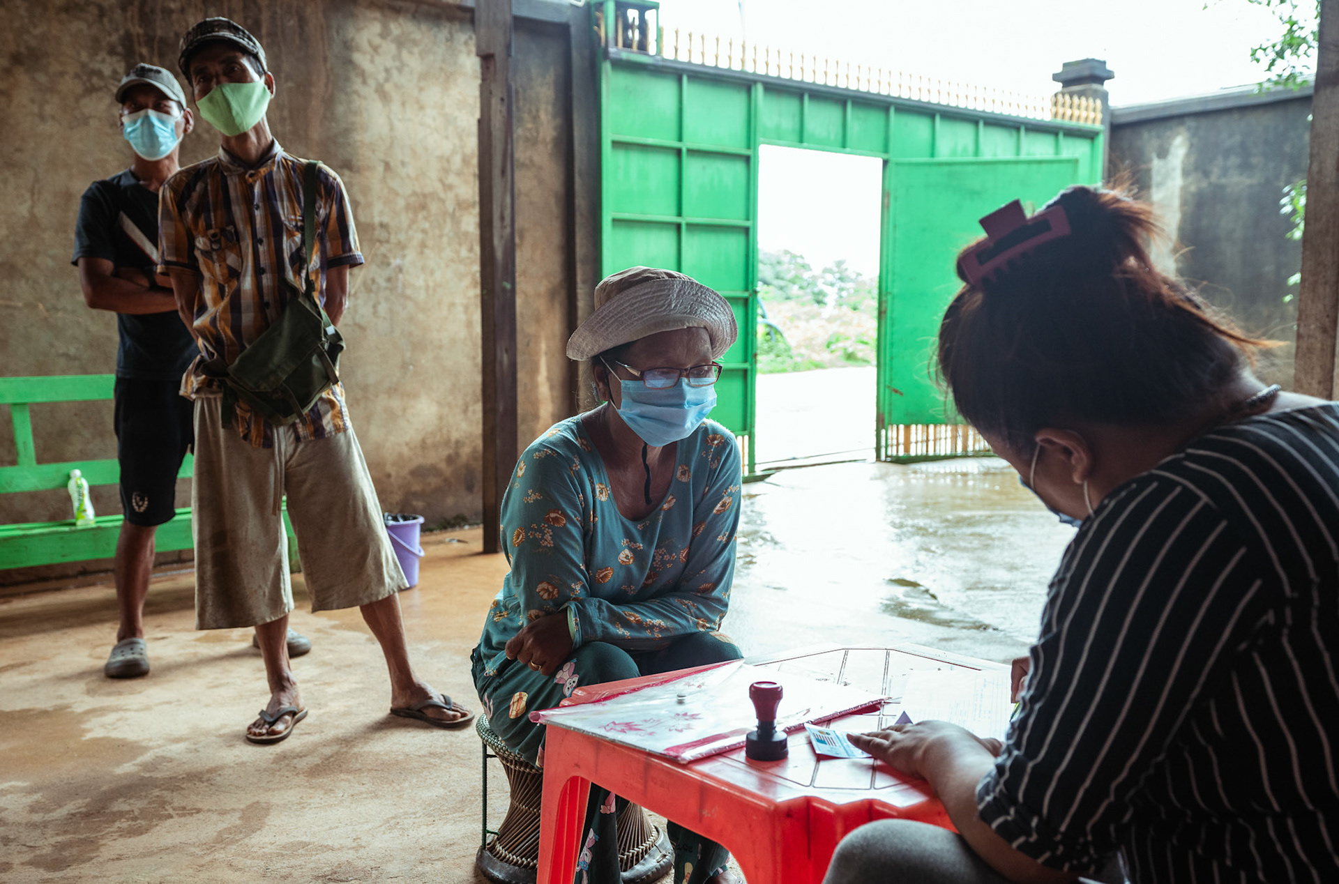 Representatives of Catholic Relief Services (CRS) carrying out the Voucher Based Distribution of basic need supplies and COVID recovery kits among People of Concern (POC) in Moreh, Manipur.