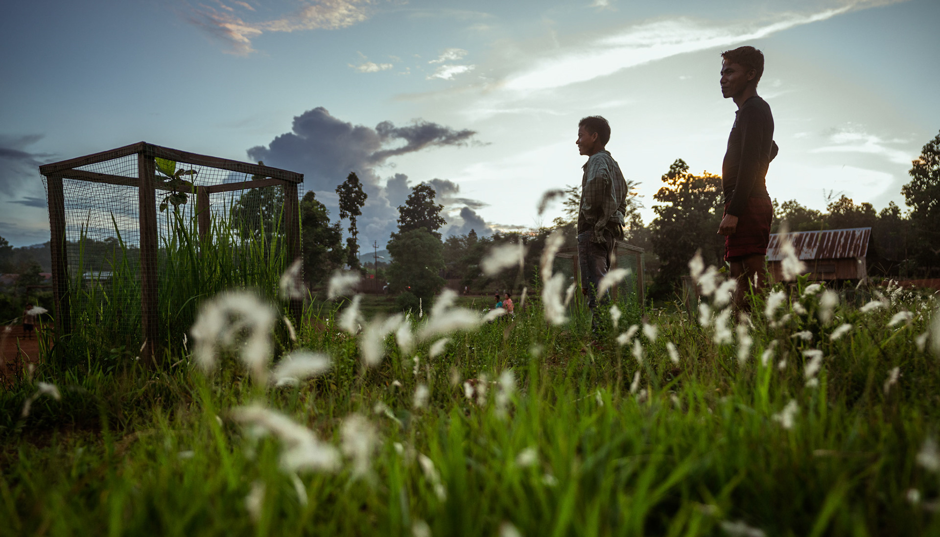 Young refugees in Moreh, Manipur, watch the children's football game during COVID-19 Response and Recovery Program.