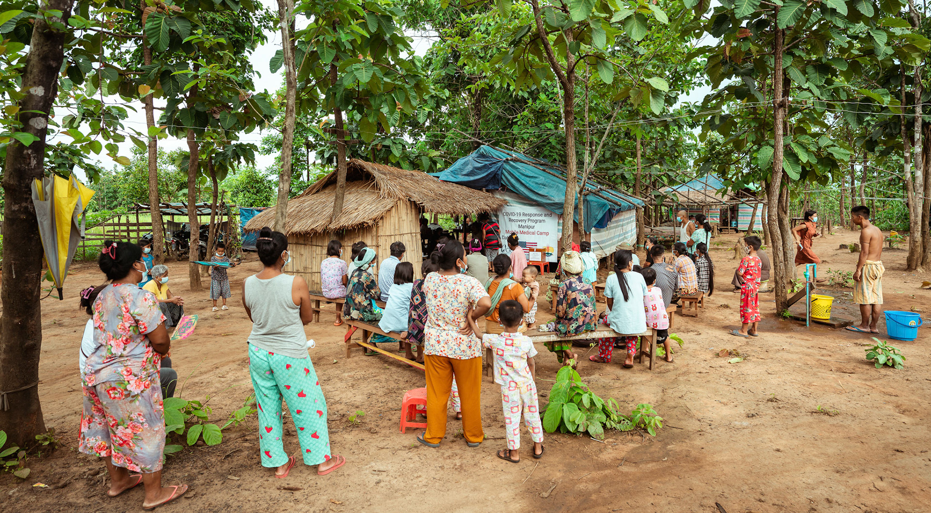 Refugees of Moreh, Manipur, gather to attend the medical camp organised by Catholic Relief Services.