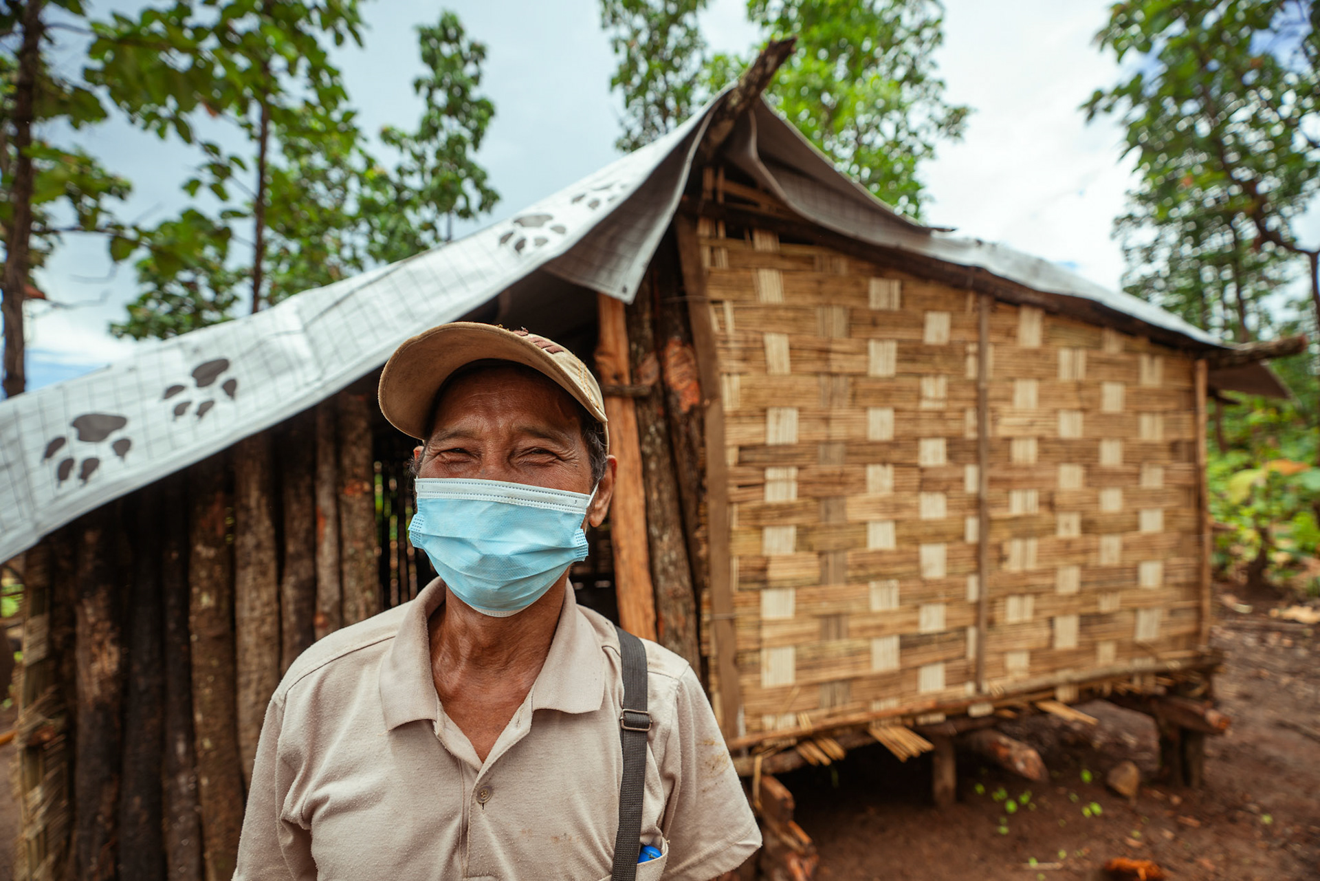 A refugee in front of his now tarpaulin covered house in Moreh, Manipur, received from the Voucher Based Distribution of basic need supplies and COVID recovery kits among People of Concern (POC) organised by Catholic Relief Services (CRS).