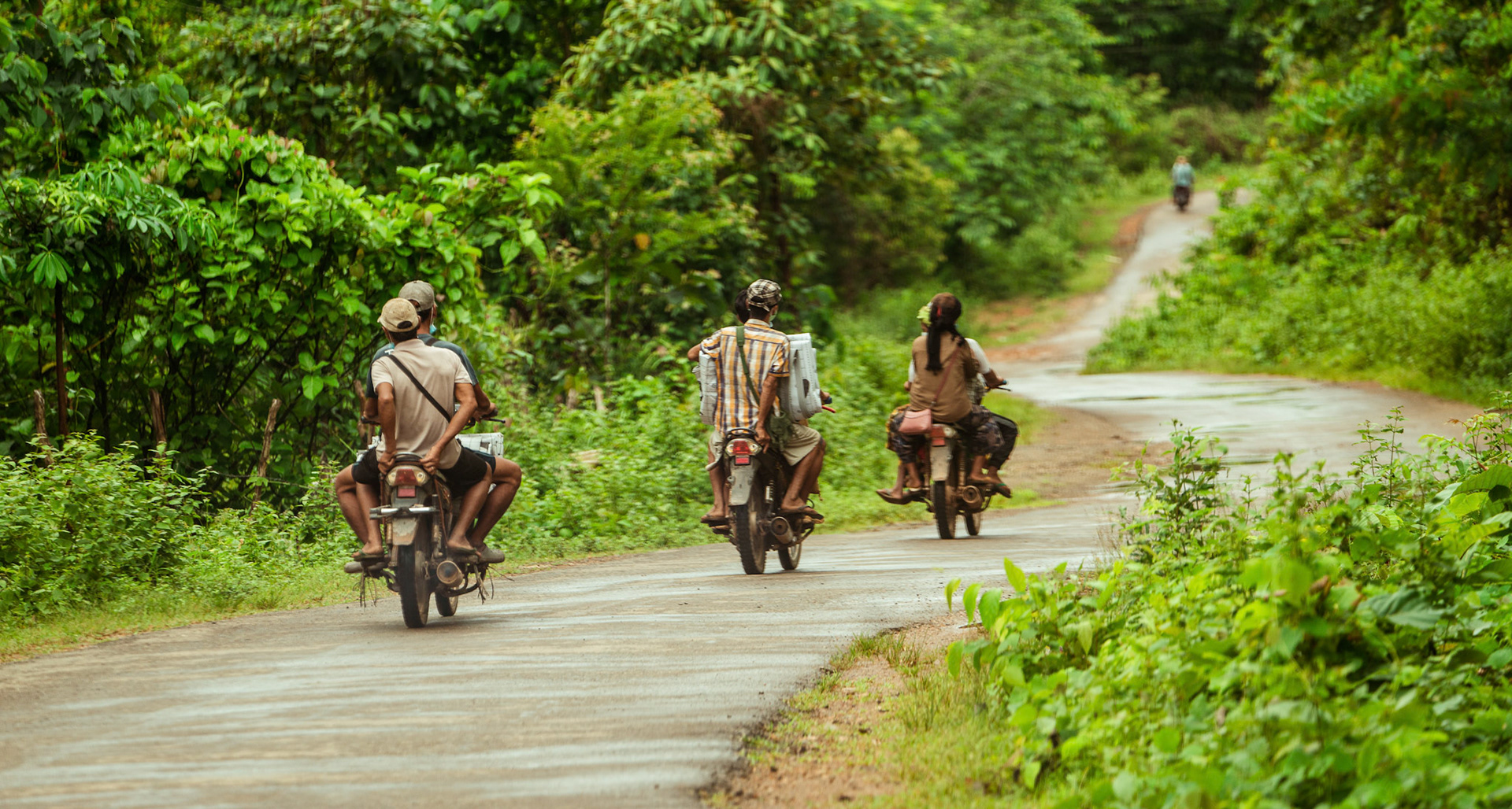 A group of refugees in Moreh, Manipur, carrying basic needs supplies back to thier homes after the Voucher Based Distribution of basic need supplies and COVID recovery kits among People of Concern (POC) in Moreh, Manipur organised by Catholic Relief Services (CRS)