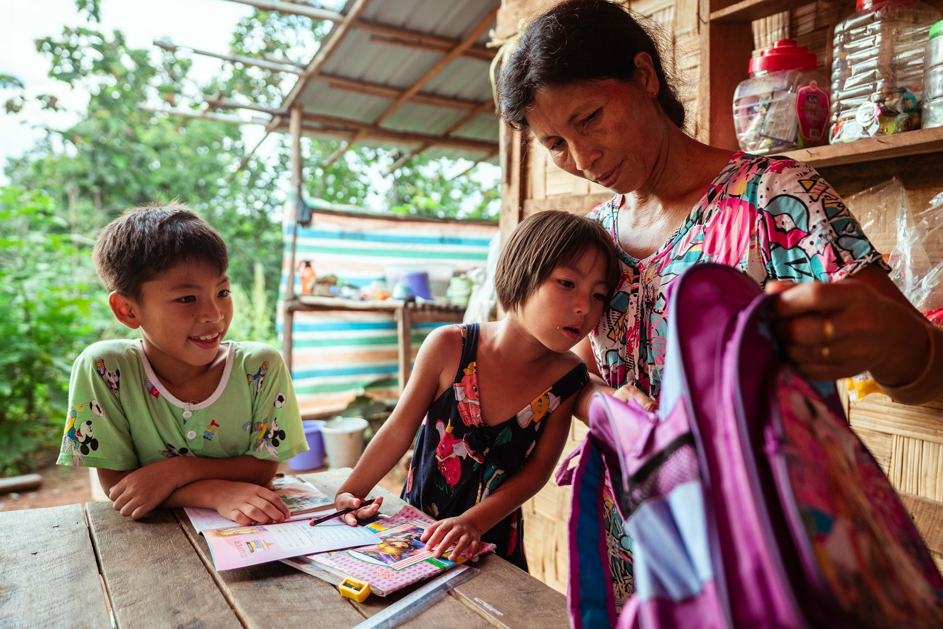 Mothers tutoring their children after attending skill development and adult education modules organised by members of CRS in Moreh, Manipur.