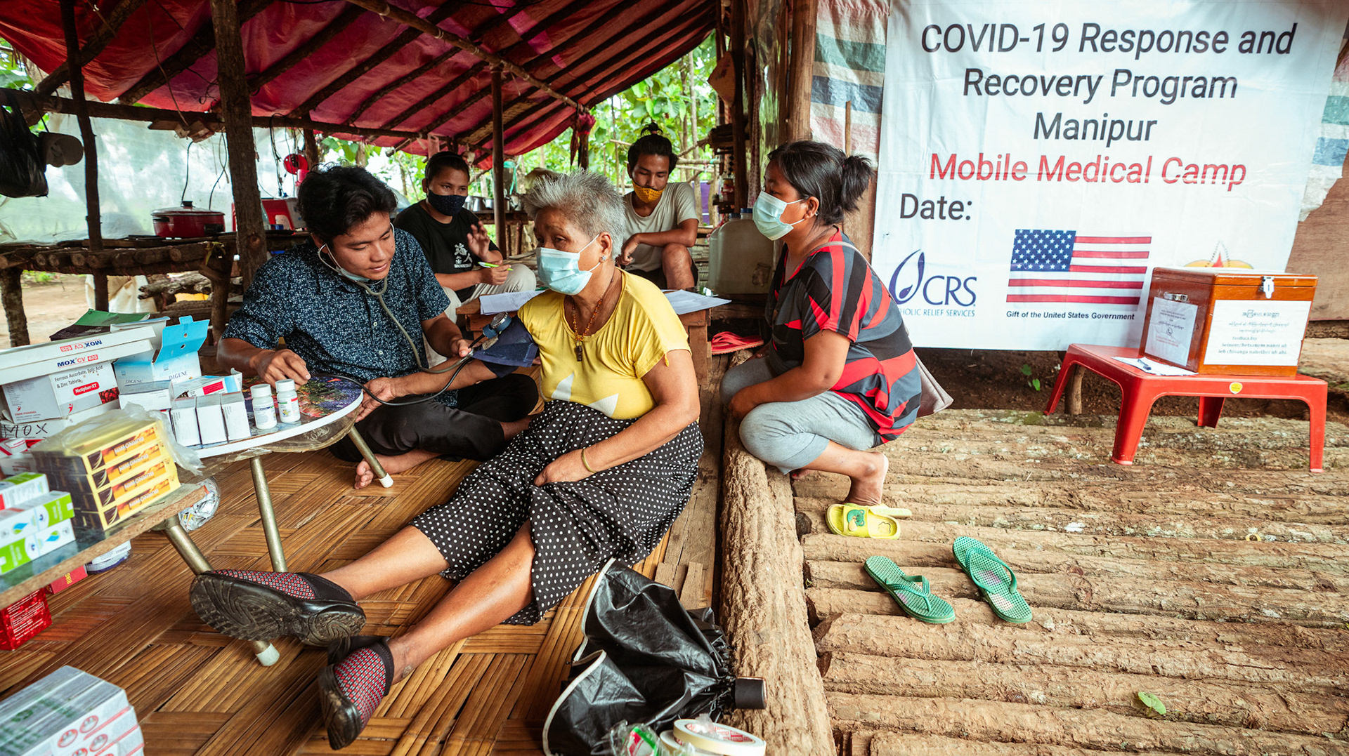 Refugees of Moreh, Manipur attending the medical camp being organised by Catholic Relief Services (CRS).