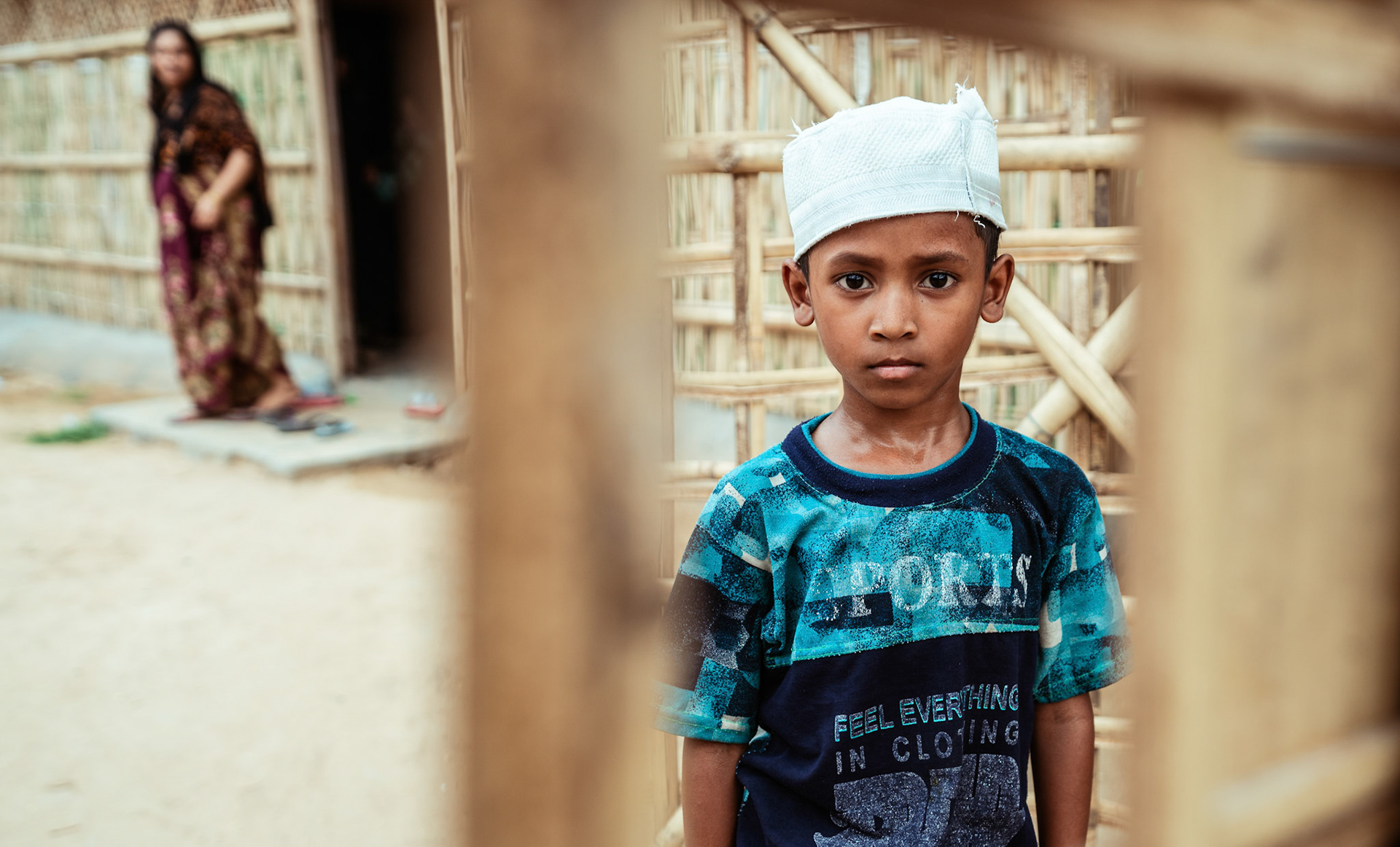 Young Rohingya refugee boys standing outside the learning centre in Mewat, Haryana during the Catholic Relief Services (CRS) refugee relief initiative.