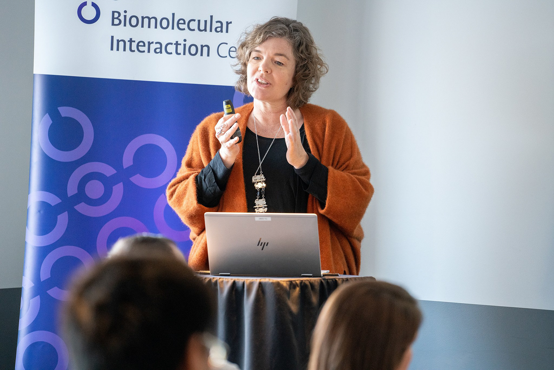 Professor Dame Juliet Gerrard from the University of Auckland gives a talk at a conference
