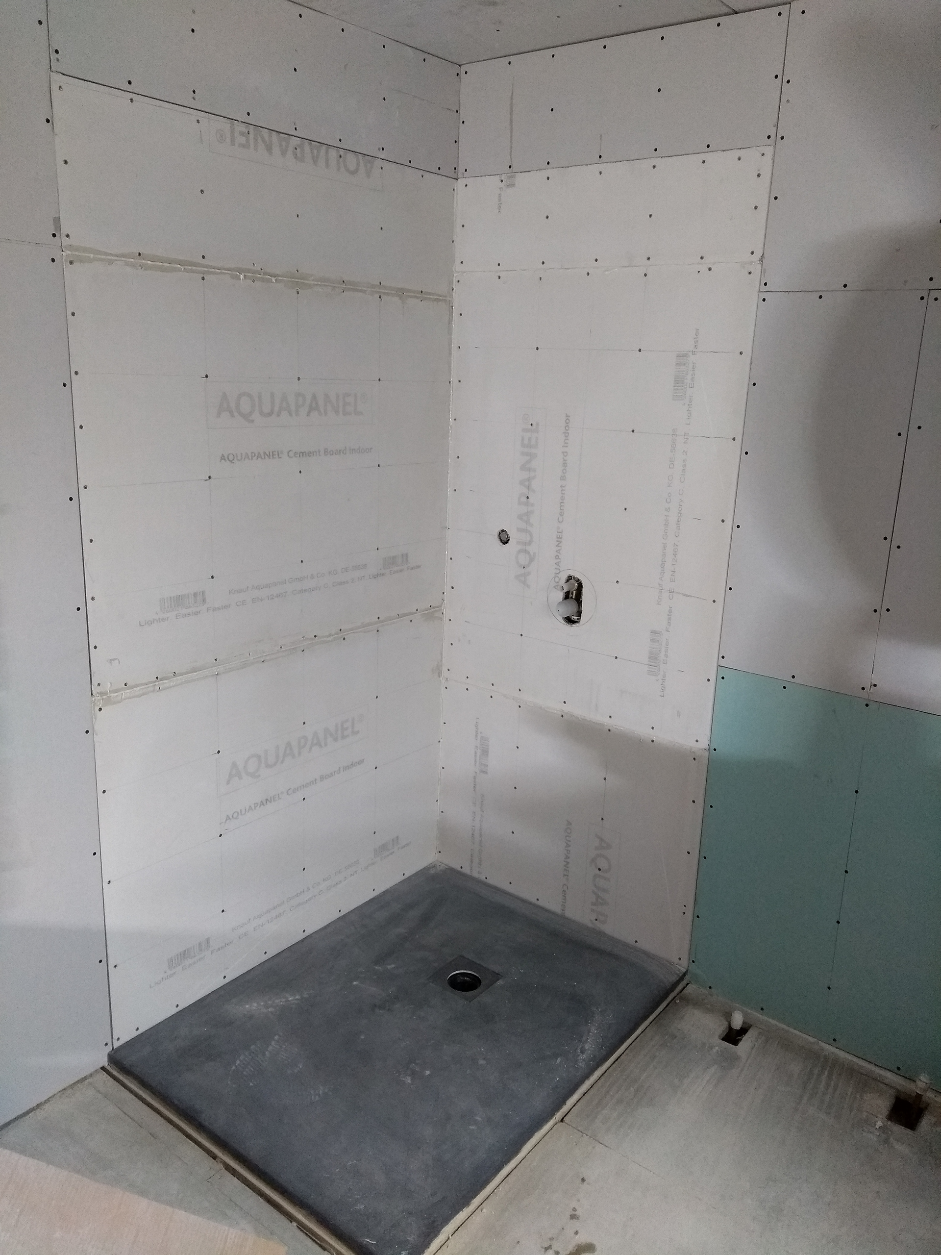 Cement boards installed in the wet shower area
