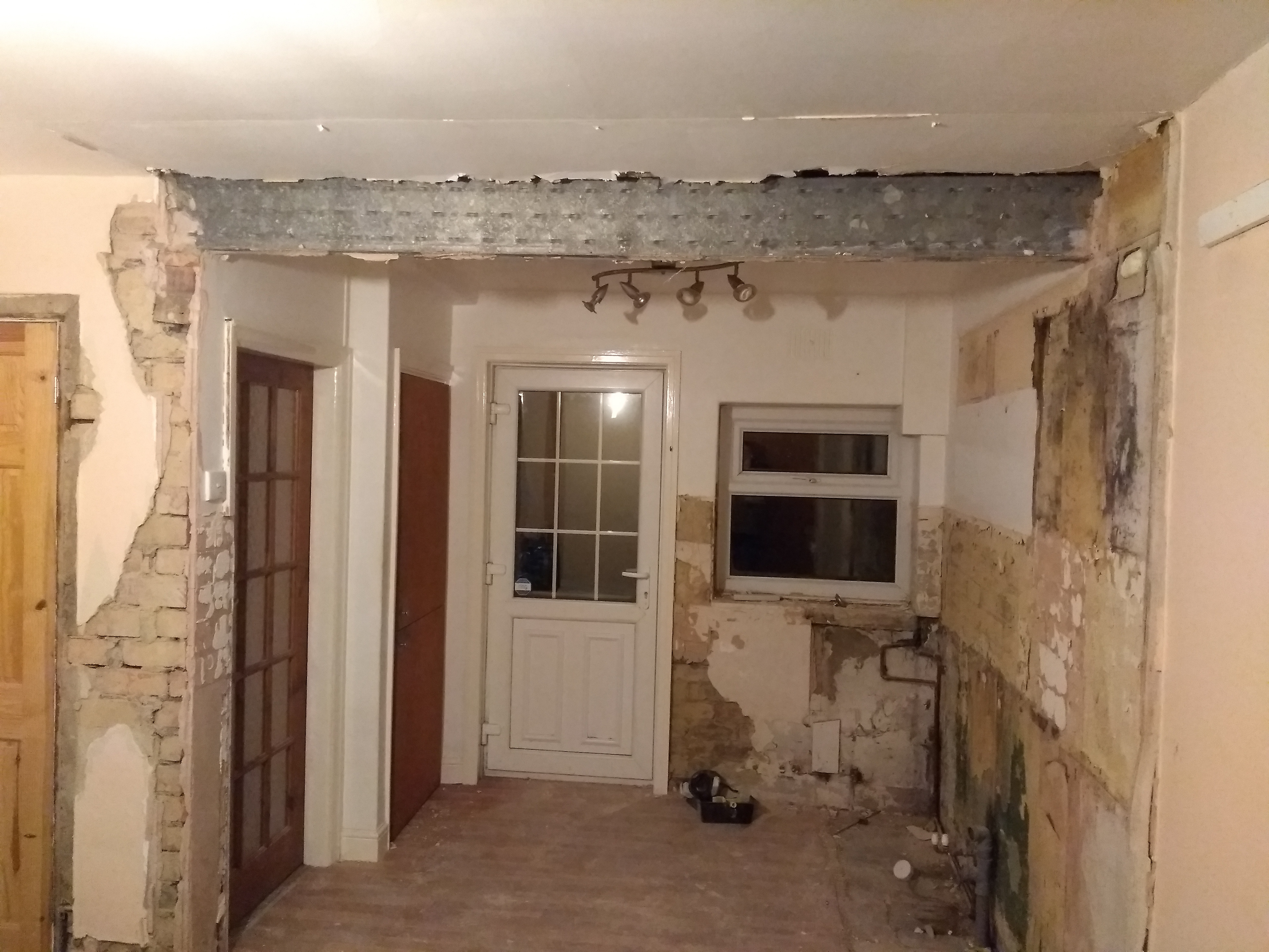 Old kitchen and dividing wall removed to create a new open plan kitchen/diner design