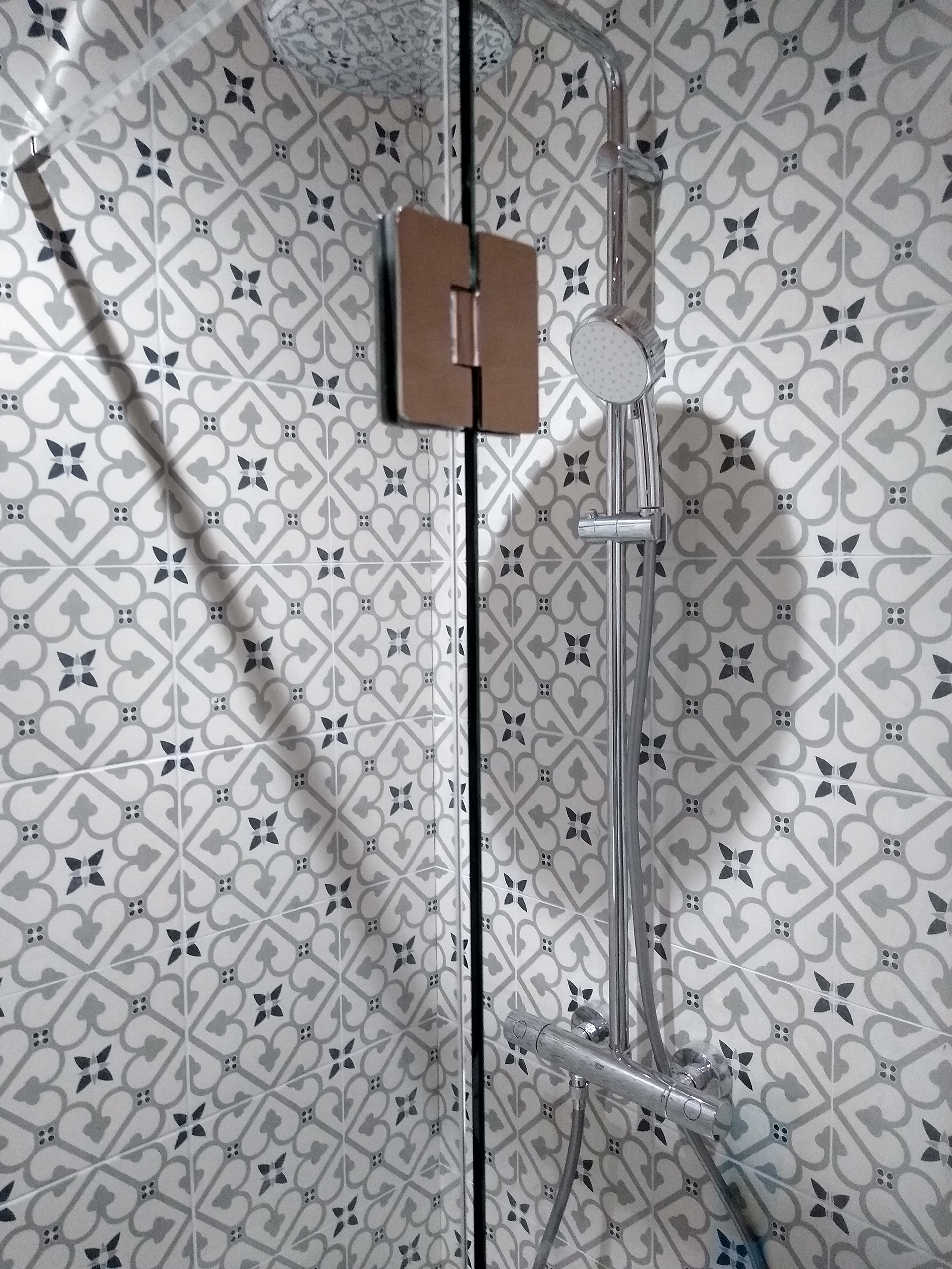 Tiling complete and shower with enclosure fitted
