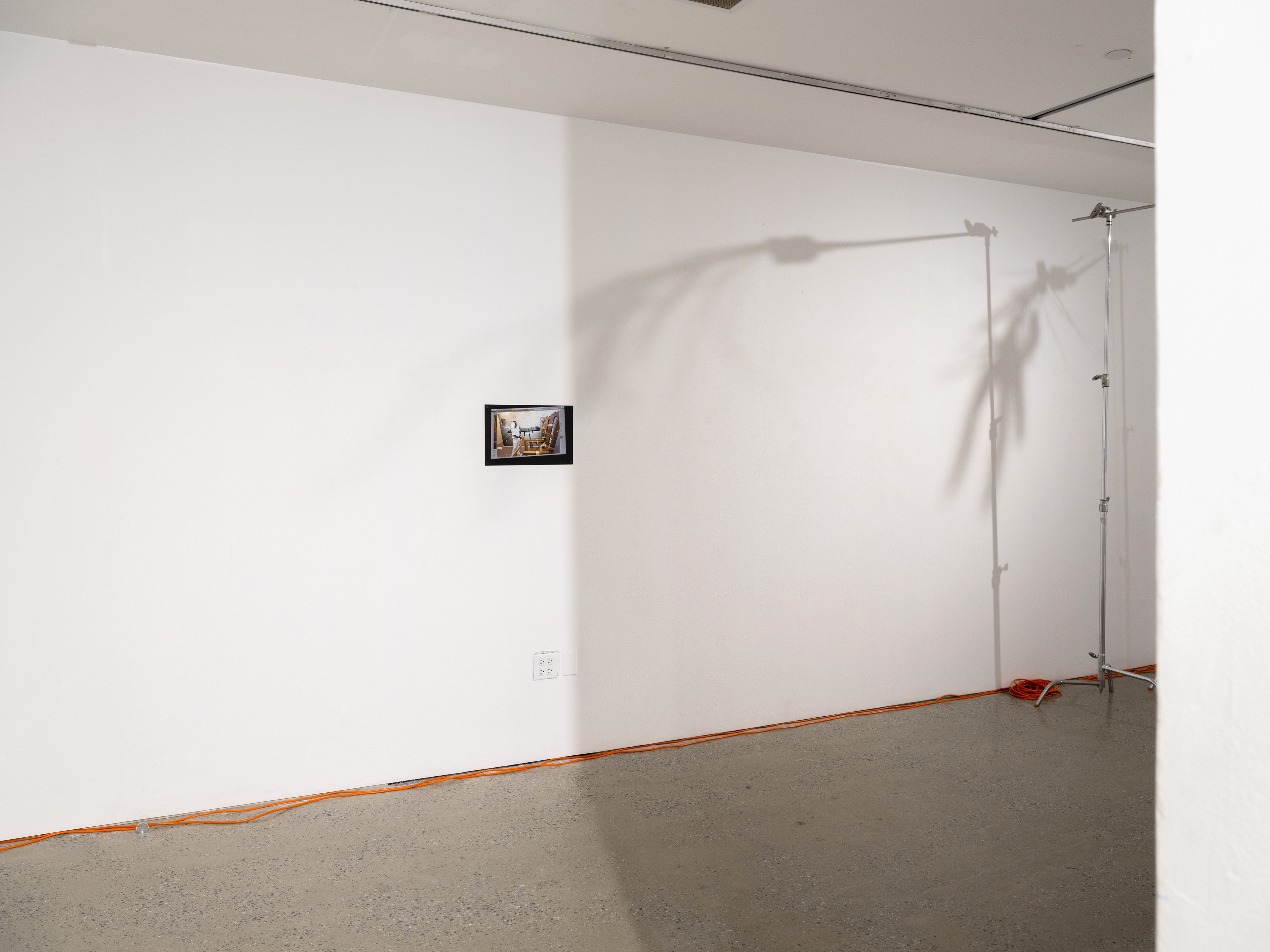 'Palimpsest' materials: unlicensed Alamy stock image, non-archival pigment print behind non-uv protective plexiglass, concrete screws, humming.