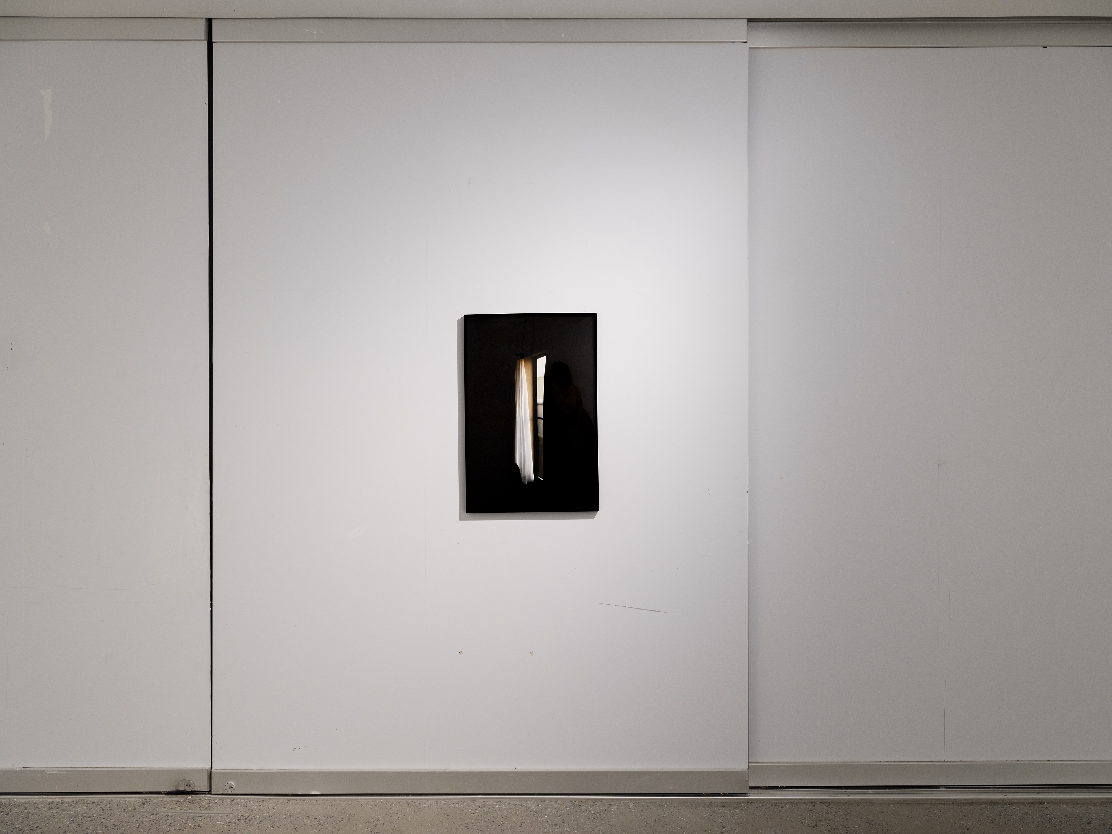 'Camera Test (Best Western Hotel, St. Francisville, LA.)' materials: 21 non-archival pigment prints behind an archival pigment print behind plexiglass.