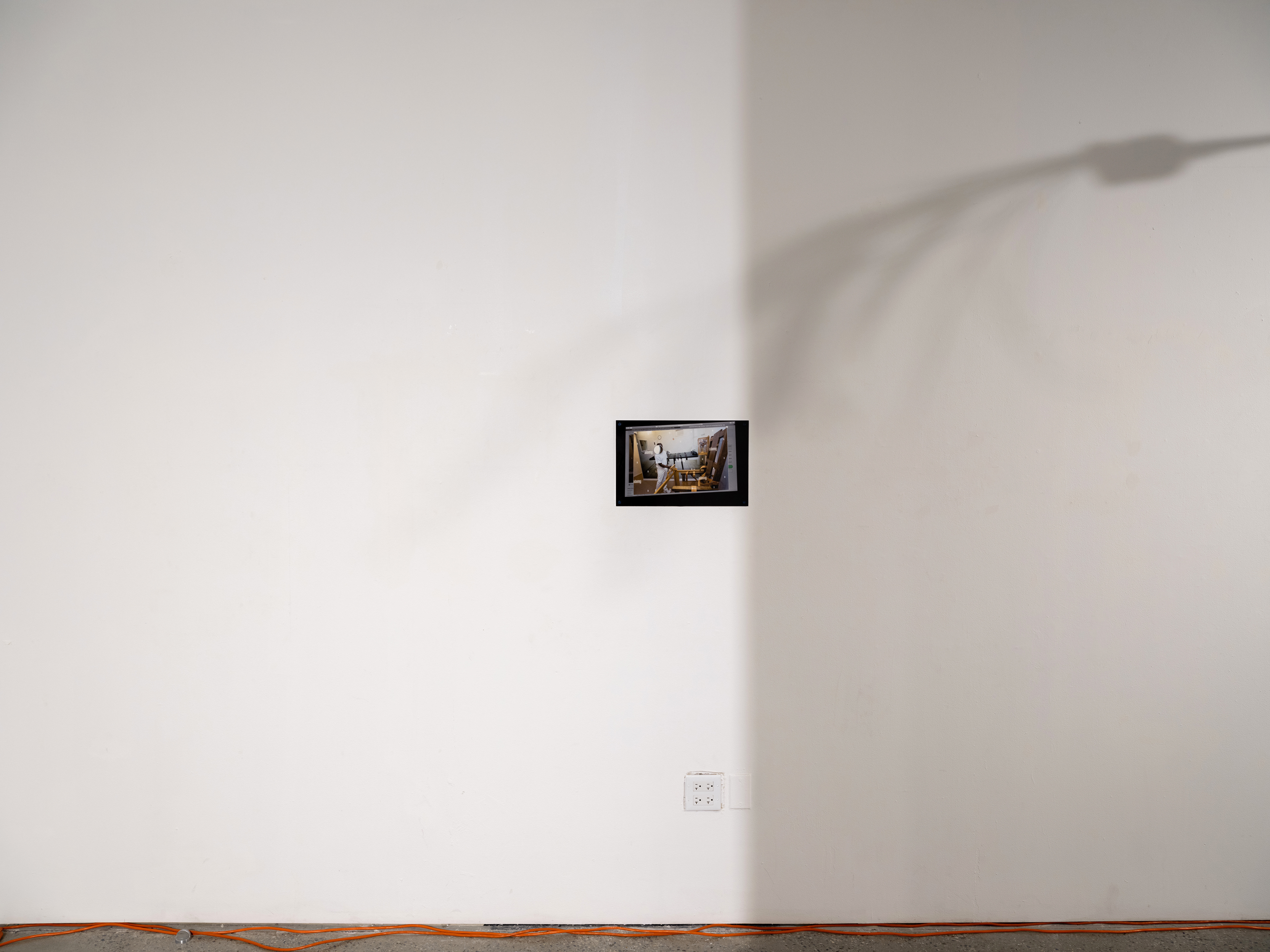 'Palimpsest' materials: unlicensed Alamy stock image, non-archival pigment print behind non-uv protective plexiglass, concrete screws, humming.