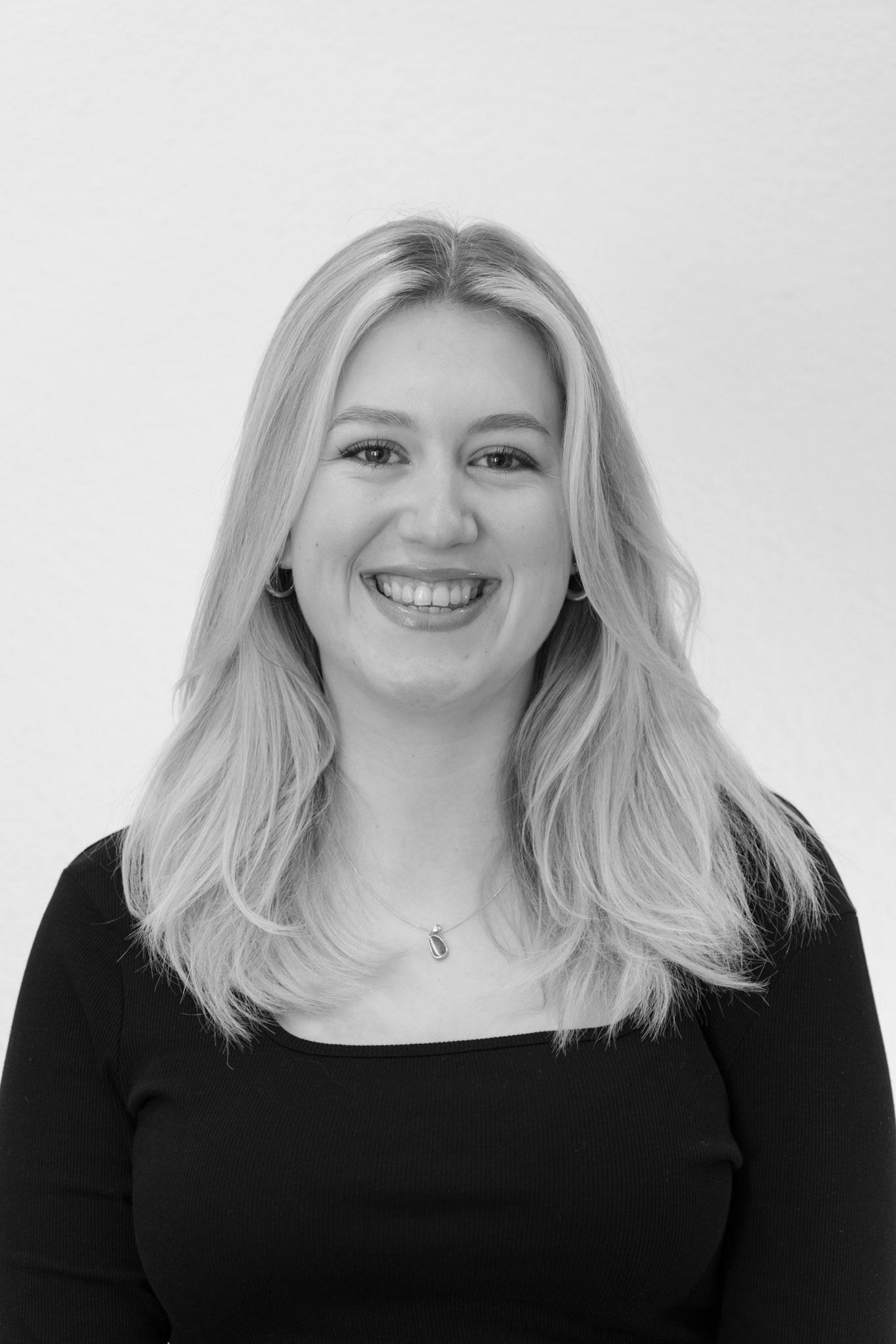 Black and white headshot of a woman