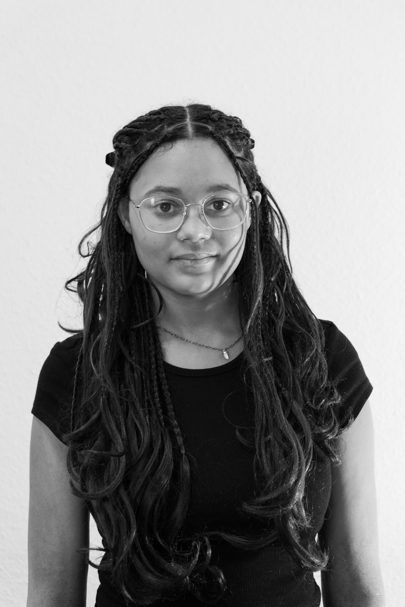 Black and white headshot of a woman
