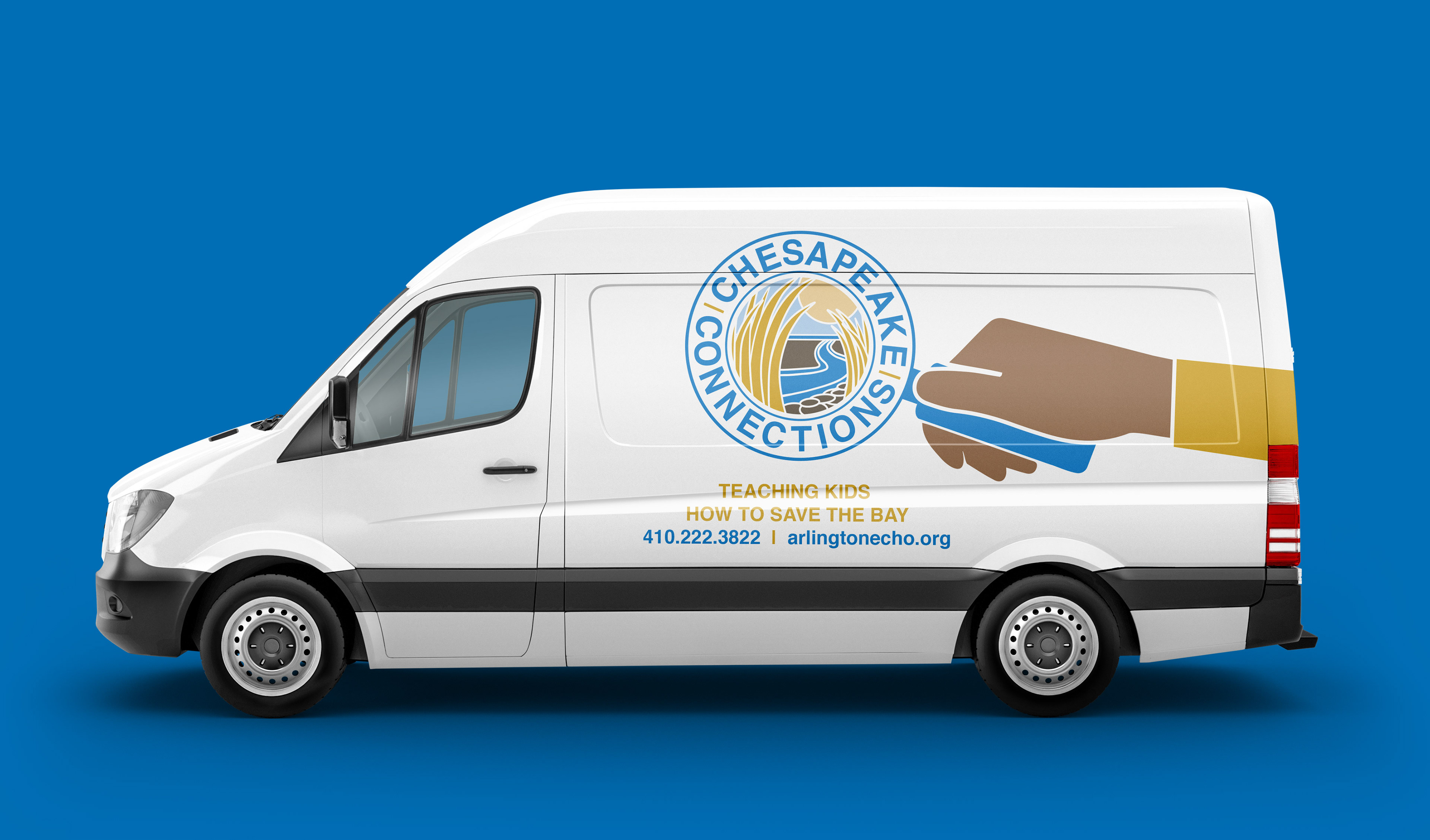 The side of a white van with the Chesapeake Connections wrapper on it. The wrapper shows a brown hand holding the magnifying glass logo. Underneath of this is text reading "Teaching kids how to save the bay", and their contact information below that. This van sits on a blue background..