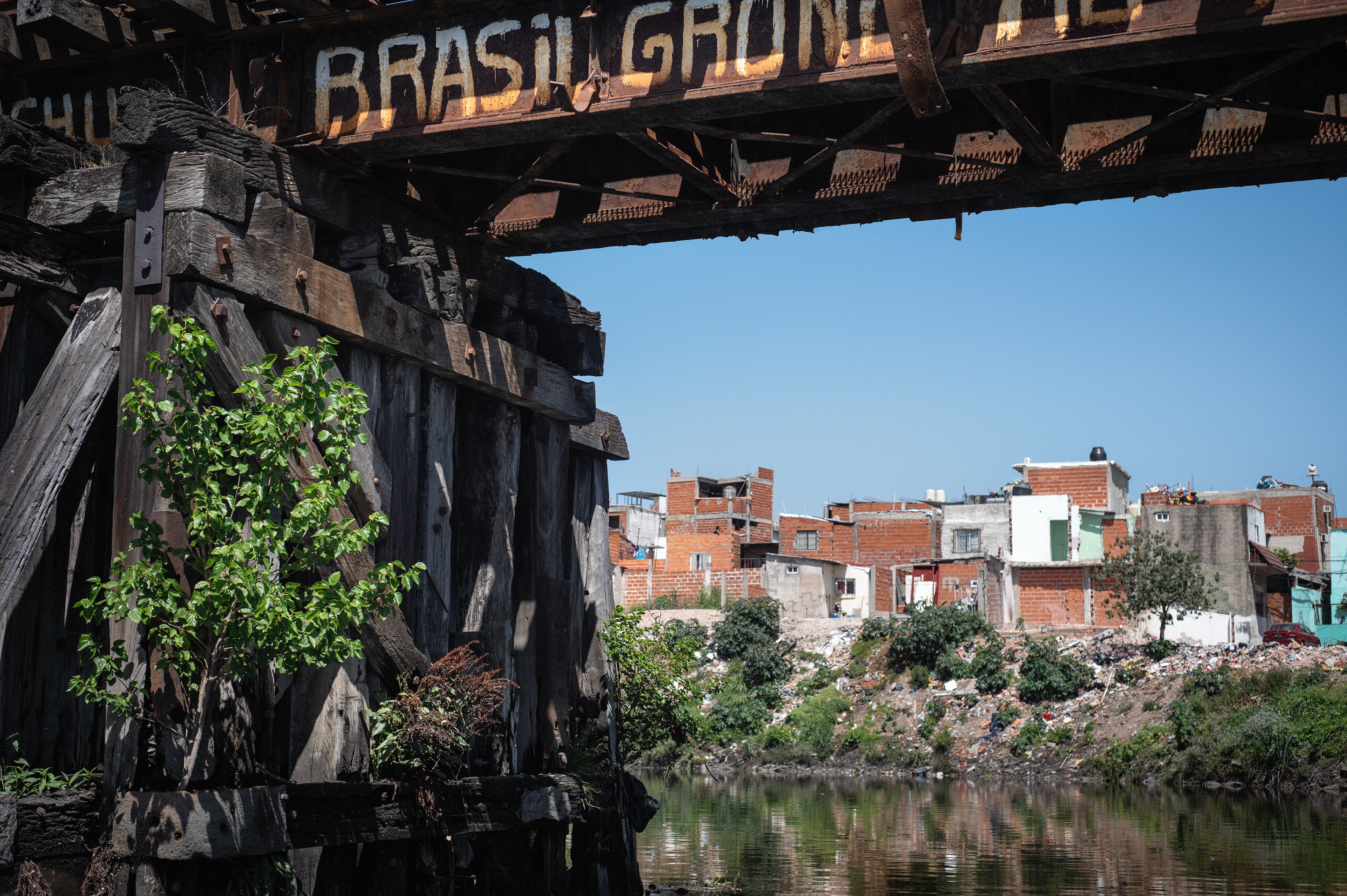 View of houses in the poor Zavaleta neighborhood over the Riachuelo River. In 2004, residents of the river basin, filed a lawsuit against the city, government and industrial polluters along the river and demanded action. The Supreme Court's ruling ordered the government, via the Autoridad de Cuenca Matanza Riacheulo (ACUMAR), to improve quality of life and prevent further damage. Residents now fear a new ruling on the toxic river basin will send a message that environmental protection is not a priority.