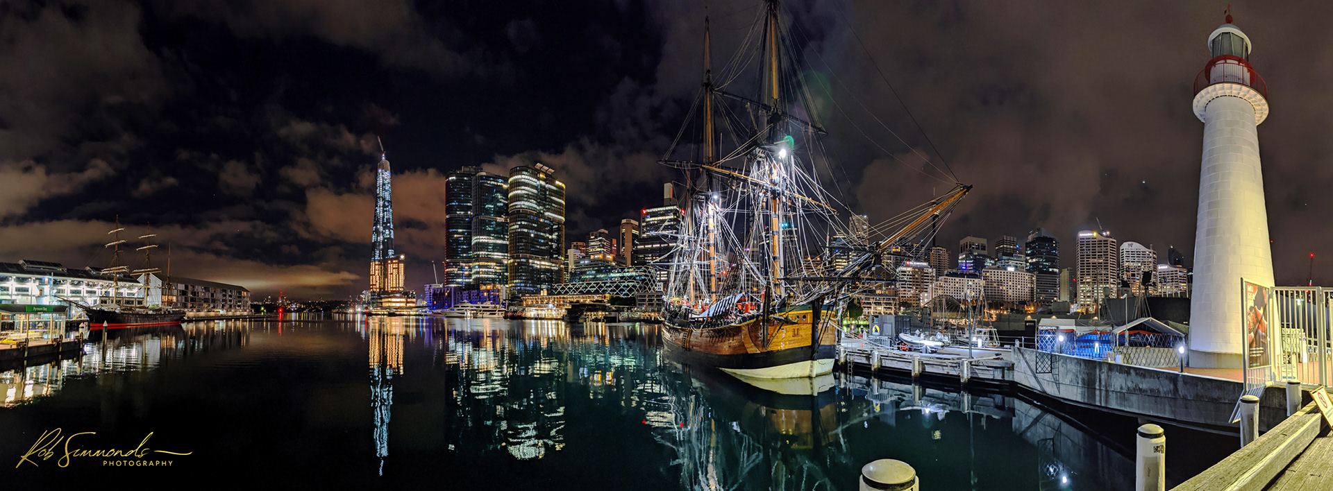 Sydney Heritage Fleet; Endeavour. Pyrmont Bay near Darling Harbour in Sydney Australia, taken in June 2020. Featuring the Sydney Heritage Maritime Fleet, the 'Endeavour'. This is my daughter's favourite photo of 'the pirate ship' (it is not a pirate ship). Tags; Sydney Australia city cbd nightlights darlingharbour nightsky clouds citylights urban urbanlandscape harbour harbor pyrmontbay boat ship heritage skyscraper reflections water WPD22Objects