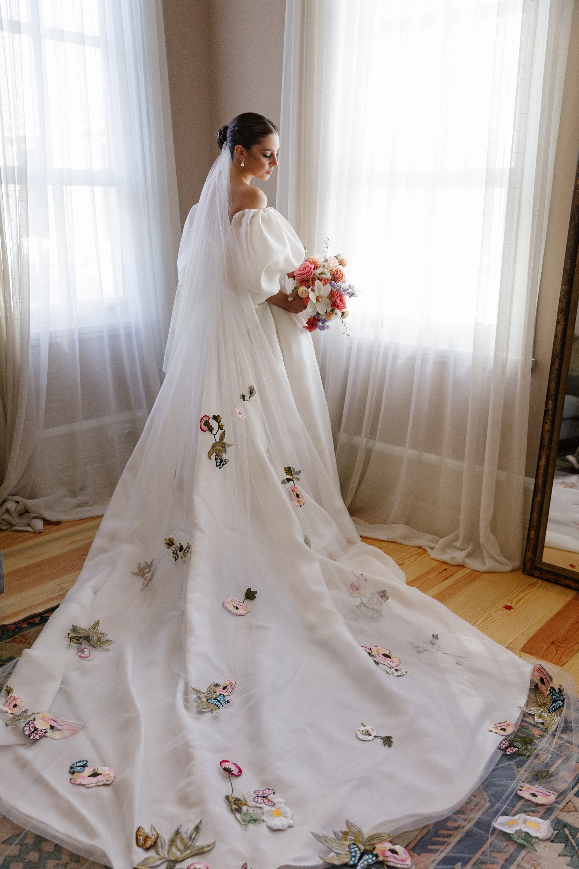 Dress and veil by Monique Lhuillier.