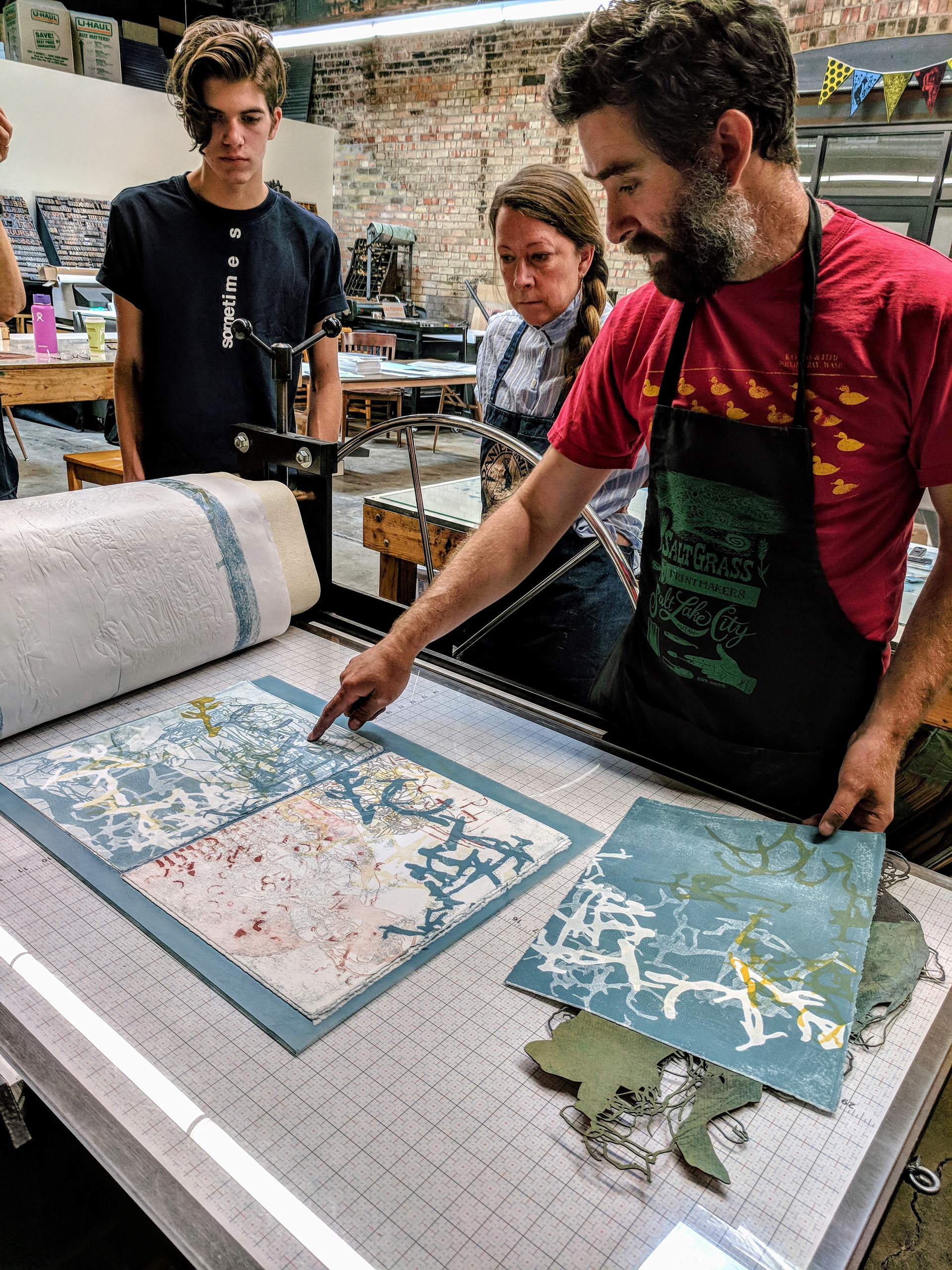 Visiting Artist, Suhka Worob demonstrating at the press during his ‘Small Blocks Big Prints' workshop. We partnered with Make Salt Lake, a local makers group, to create laser cut elements to be printed during Worob’s workshop.