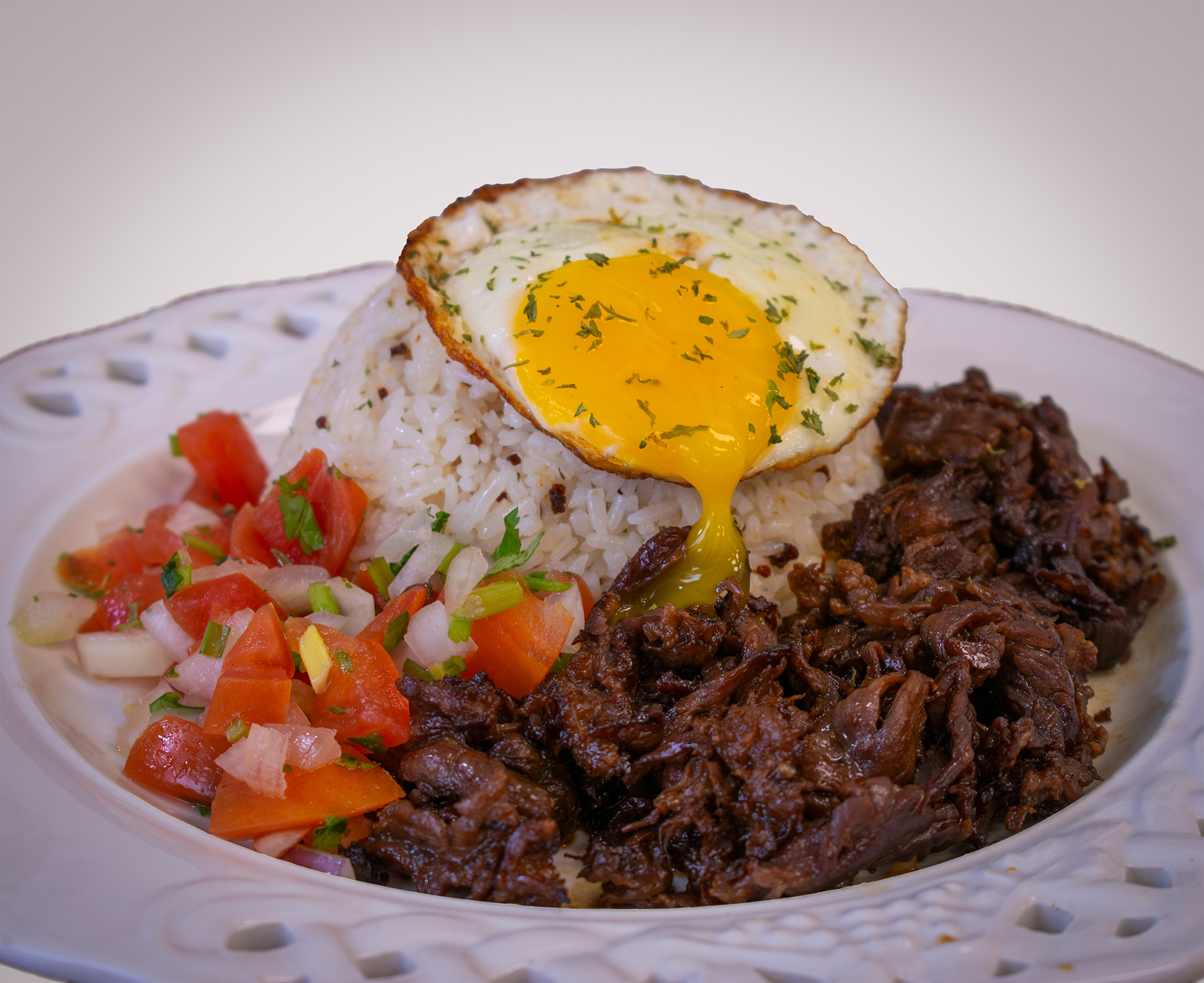 Tapsilog (Tapa, Garlic Fried Rice, Egg)