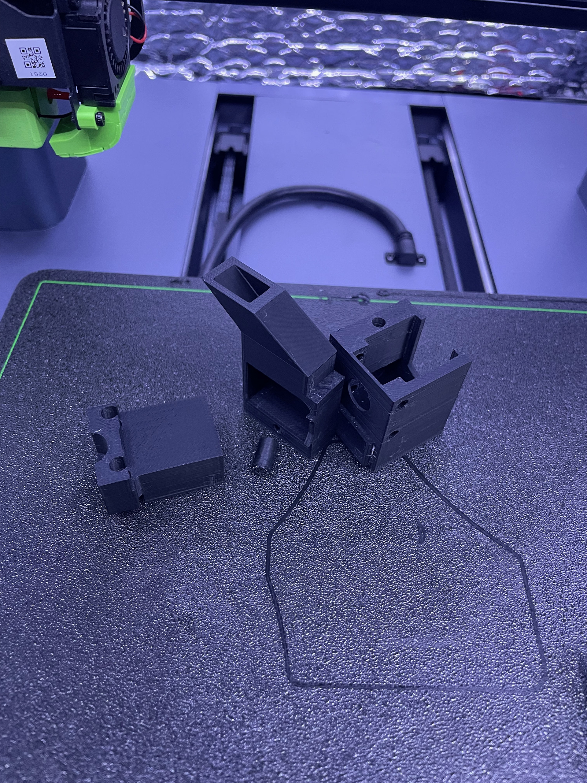 3D Printer Printing It's Own Cooling Modifications