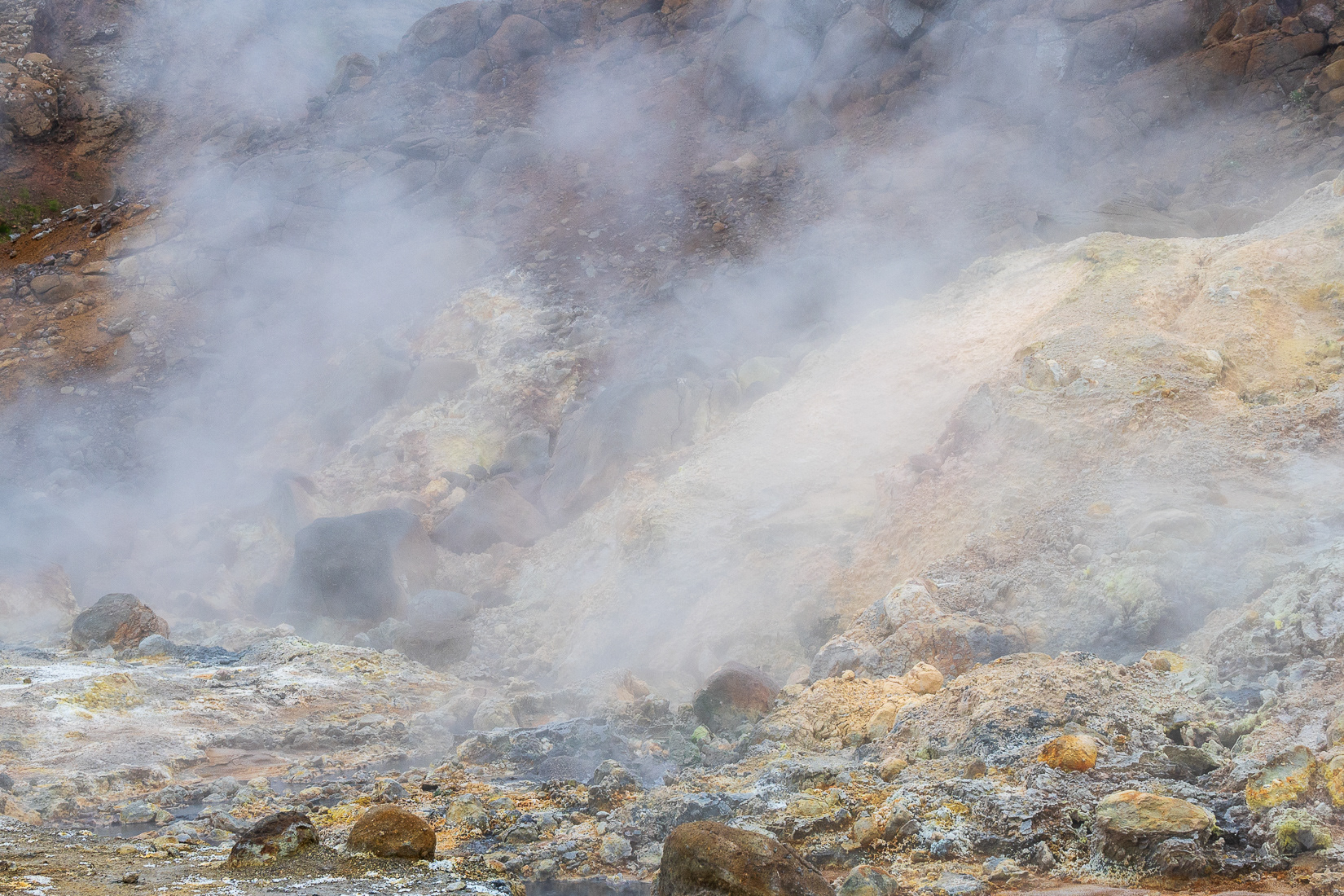 The smell of rotten eggs and the yellow deposits are evidence of the sulphuric gases.