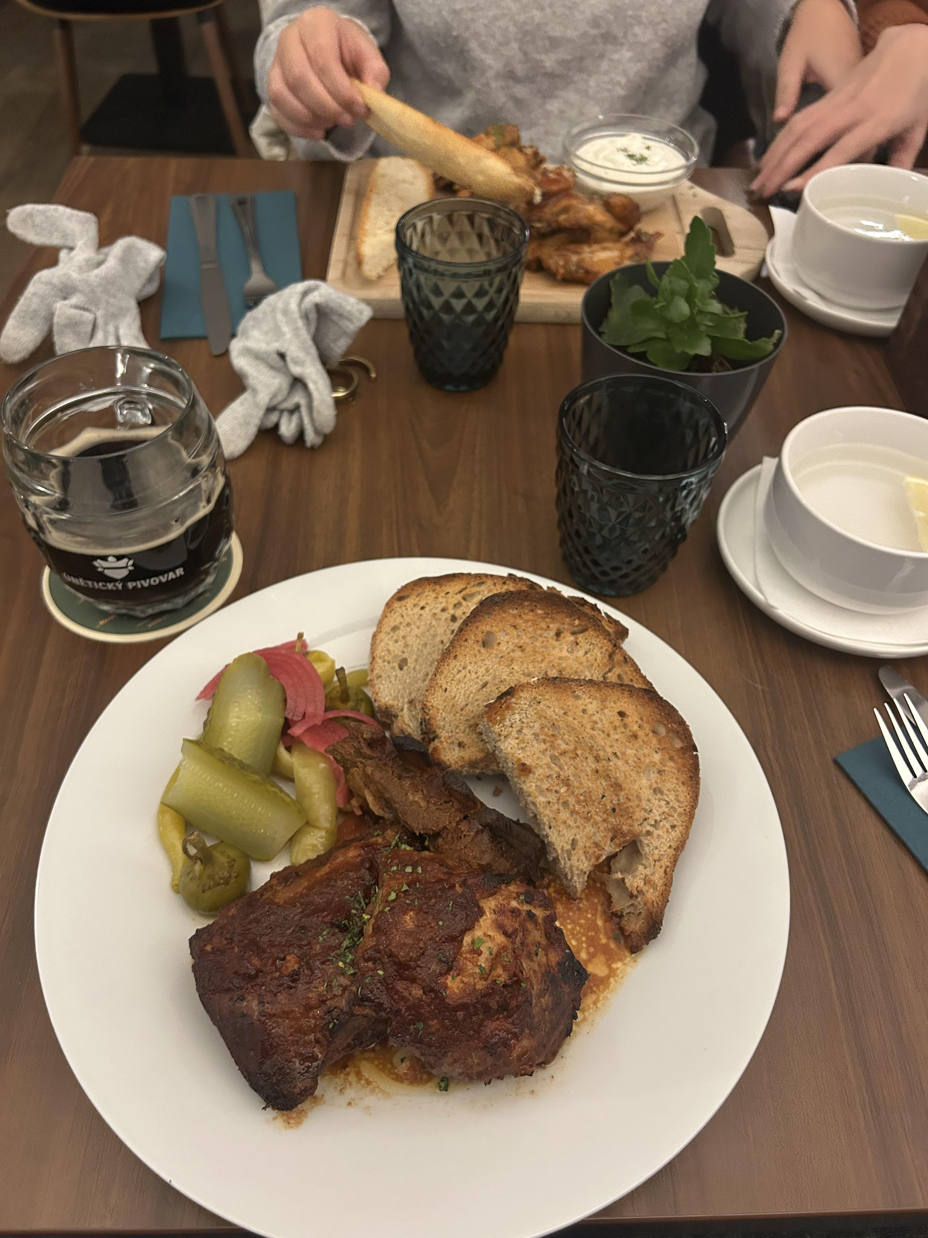 Budvar Dark and pork ribs and on the walk to the tram Alex fell wearing platform Uggs