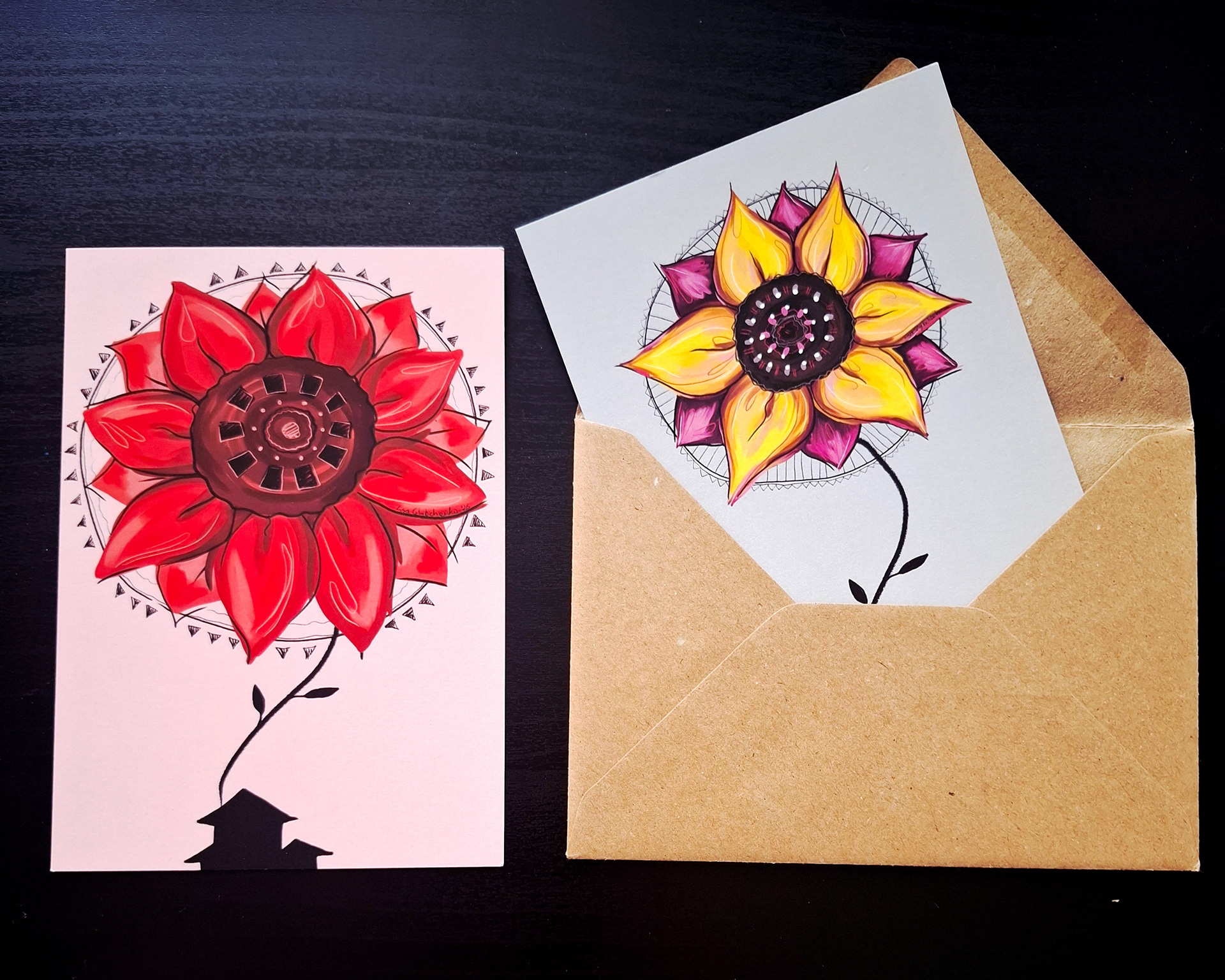 Two postcards and an envelope.