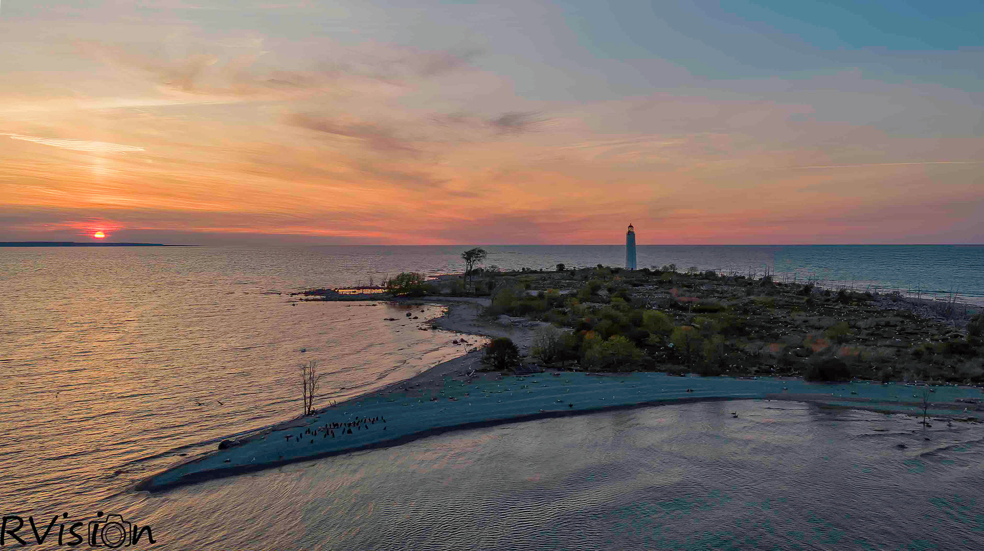 Sunset Fly Over by Nottawasaga Lighthouse