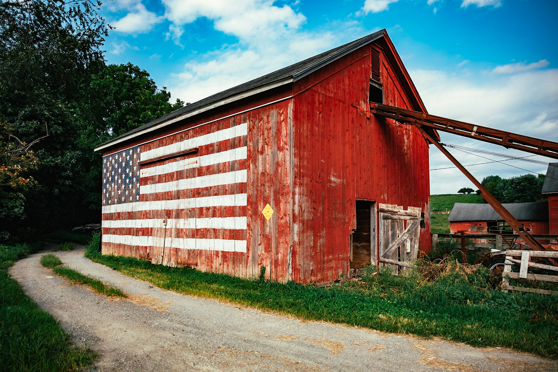 Abandoned Barn with United States American Flag, Dutchess County, Hudson Valley, New York, USA.