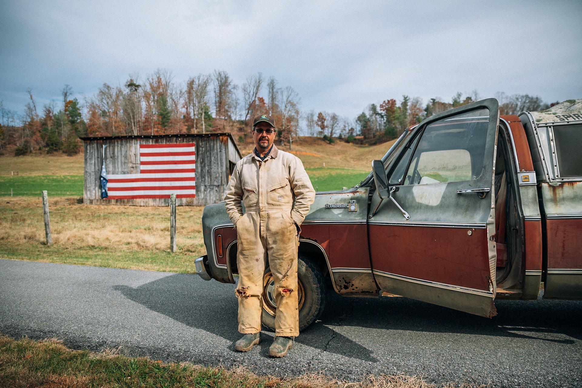 Farmer and American-USA flag, Peaks, Big Island, Virginia, USA, 2019.