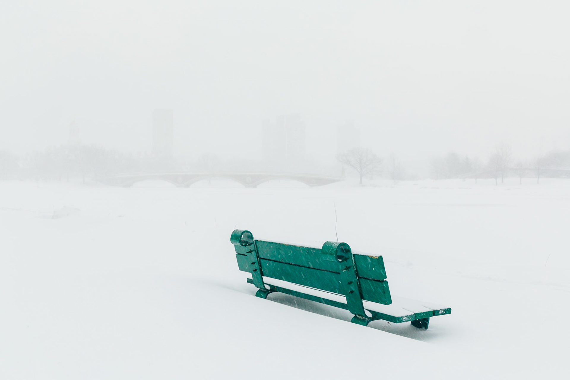 Bench on Charles River, Winter Storm Juno, Cambridge, USA.