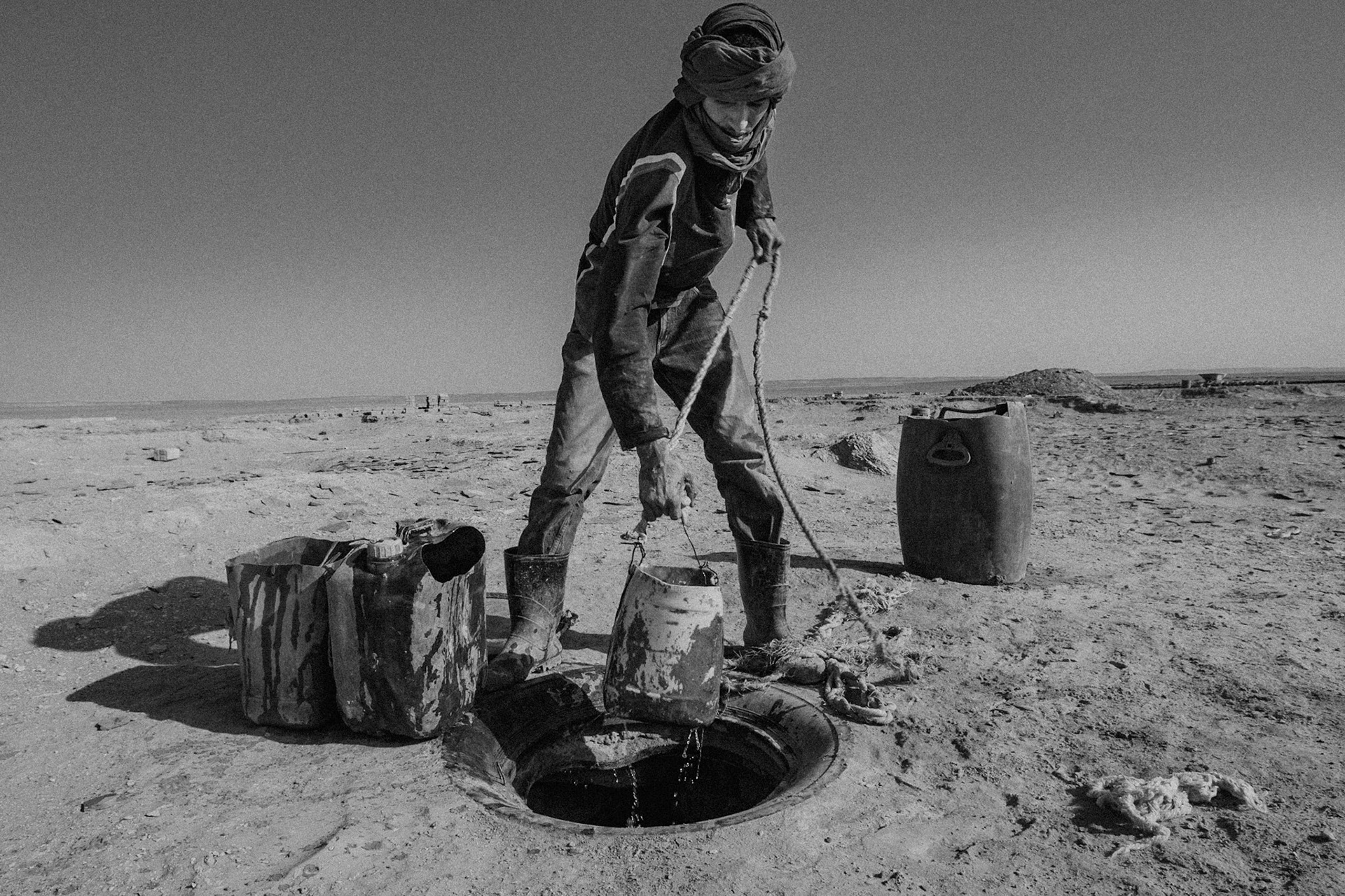 Dakhla refugee camp, Tindouf, Wilaya de Tindouf, Algerian Sahara, 2009: Extracting water from the well for adobe bricks.