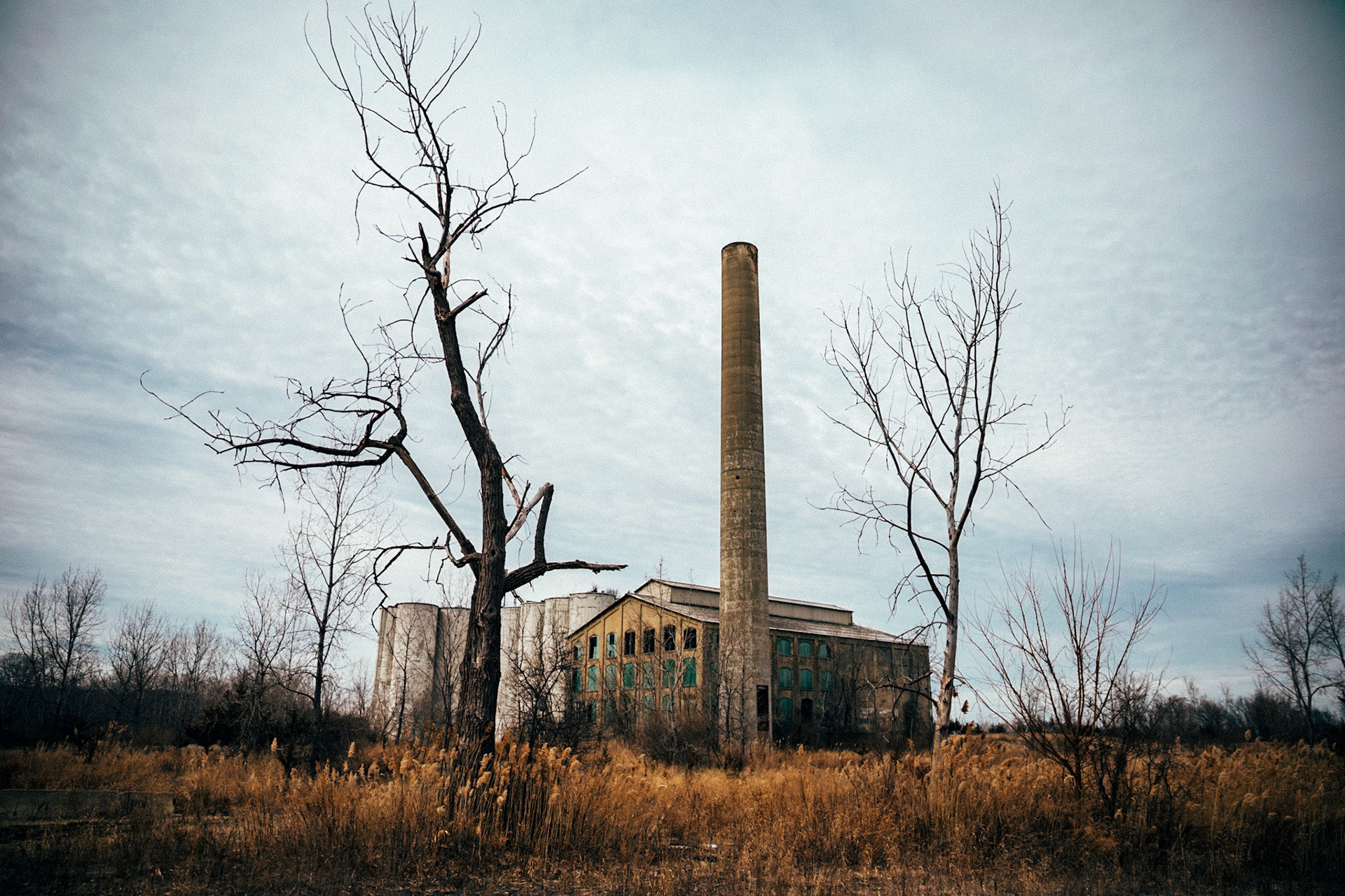 Abandoned factory and smokestack, Greenport, Hudson, Hudson Valley, New York, USA, 2019.