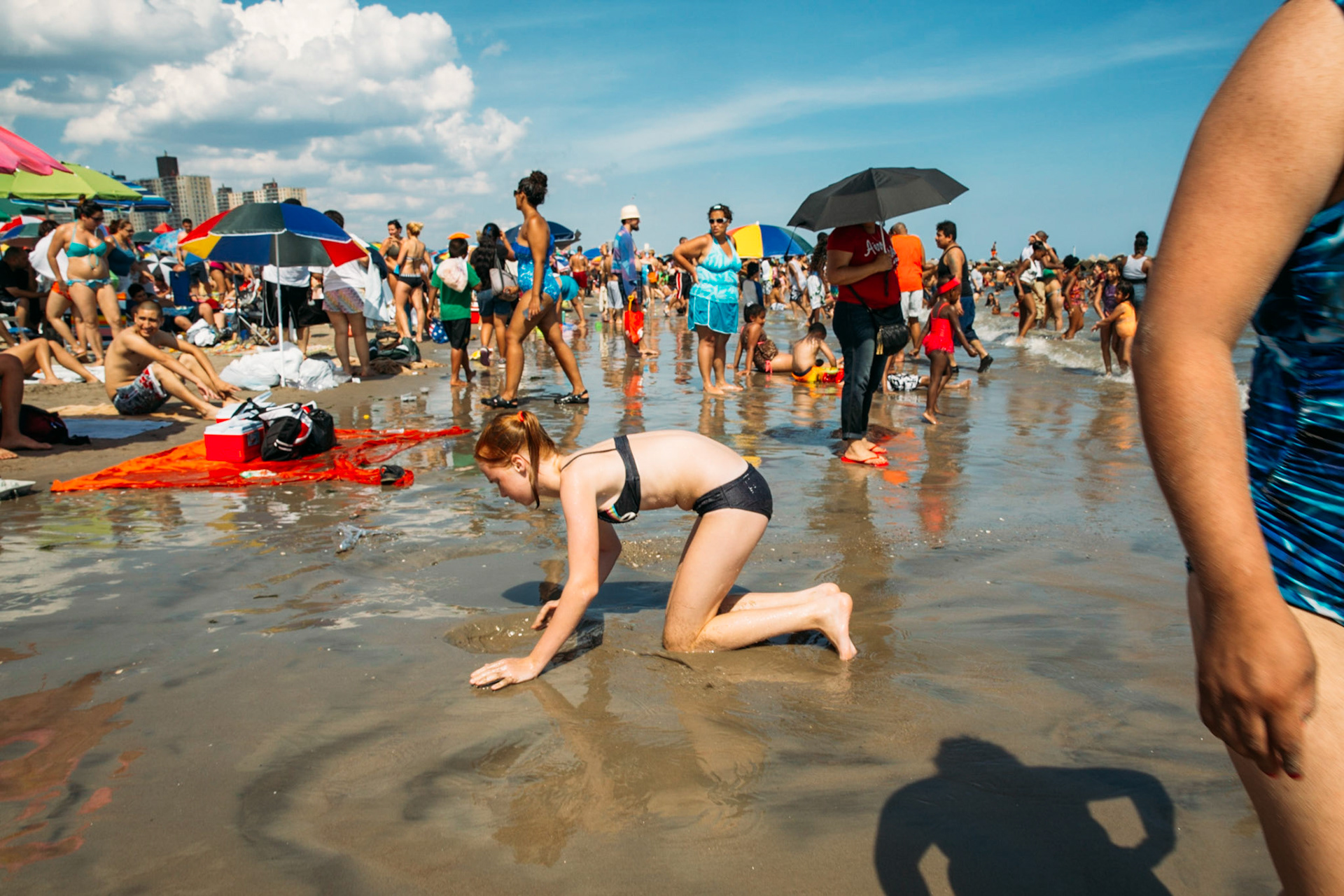 Girl Playing in the Sand, Coney Island, Brooklyn, Kings County, New York, USA, 2011.