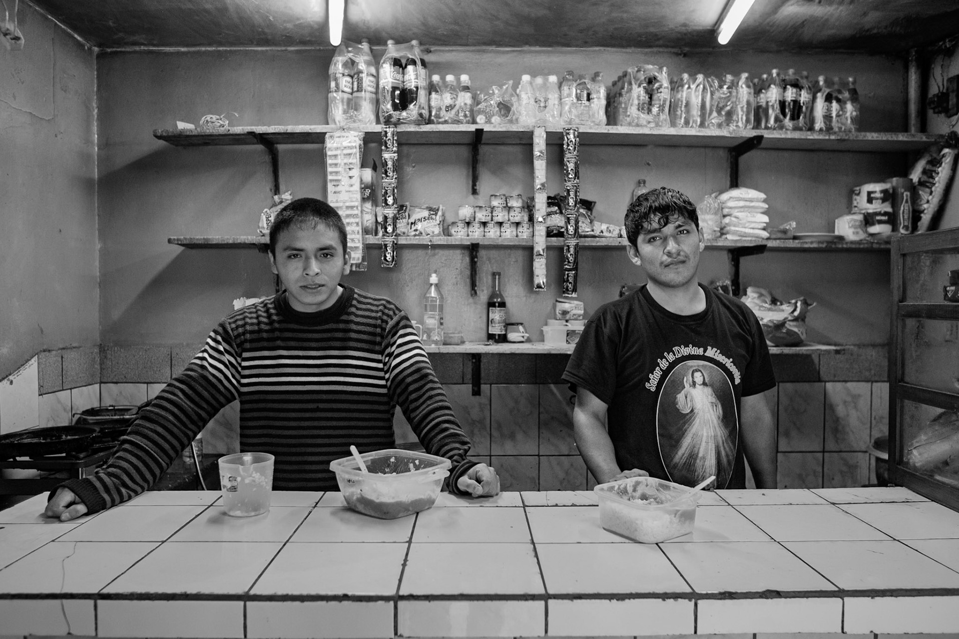 LURIGANCHO PRISON, SAN JUAN DE LURIGANCHO, LIMA, PERU: Young inmates tending to the grocery store in the prison.