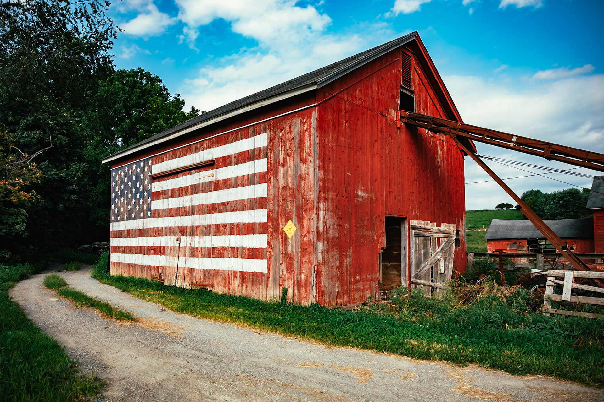 Abandoned Barn with United States American Flag, Dutchess County, Hudson Valley, New York, USA.