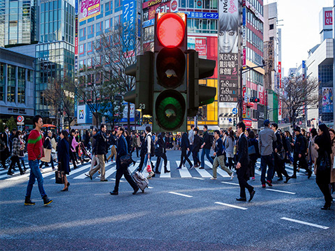 This composite of a traffic light and people in a crosswalk introduces the poem "Beautiful."
