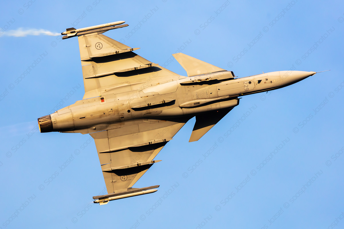Swedish Air Force SAAB JAS 39C Gripen fighter performing a high-G turn